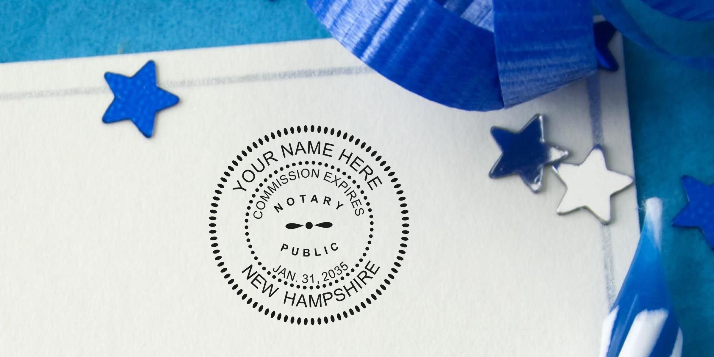 Circular New Hampshire notary public stamp on white paper reading "Your Name Here" with Jan. 31, 2035 expiration, accompanied by blue ribbon and metallic blue and silver star confetti.