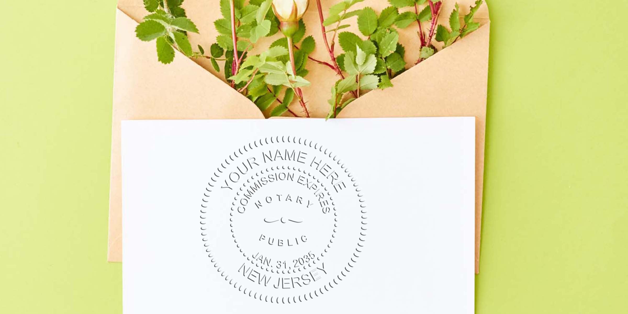 Embossed notary seal on white card partially pulled from a kraft envelope filled with rose stems and green leaves on lime background