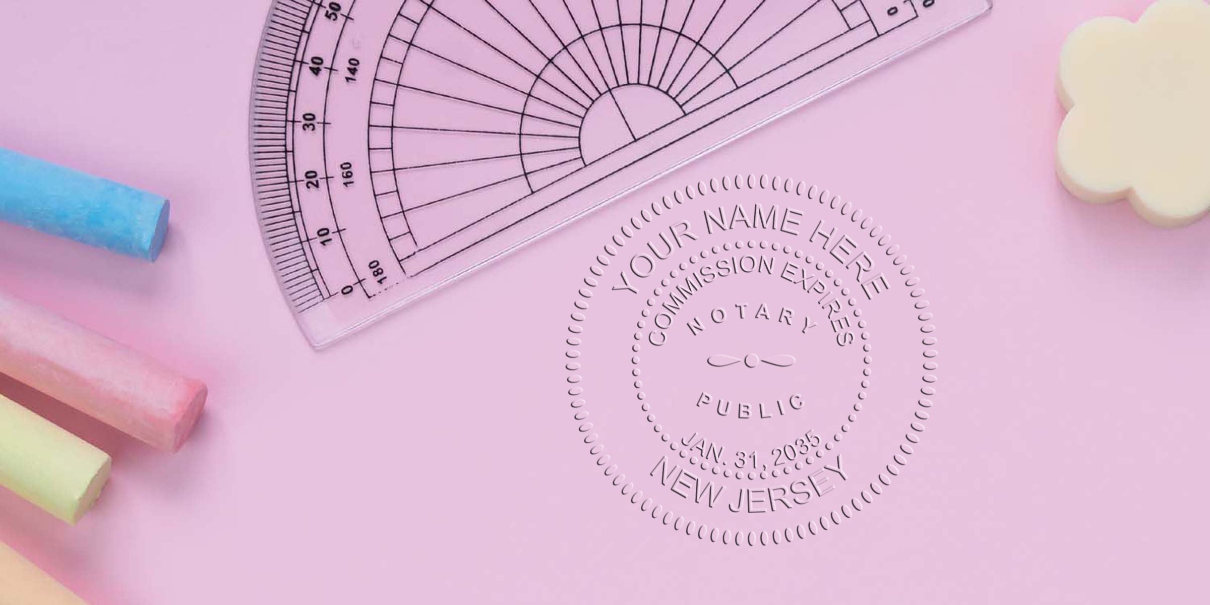 Embossed notary seal on pink paper with clear protractor, pastel sidewalk chalk sticks and flower-shaped eraser — school supplies, office stationery photo