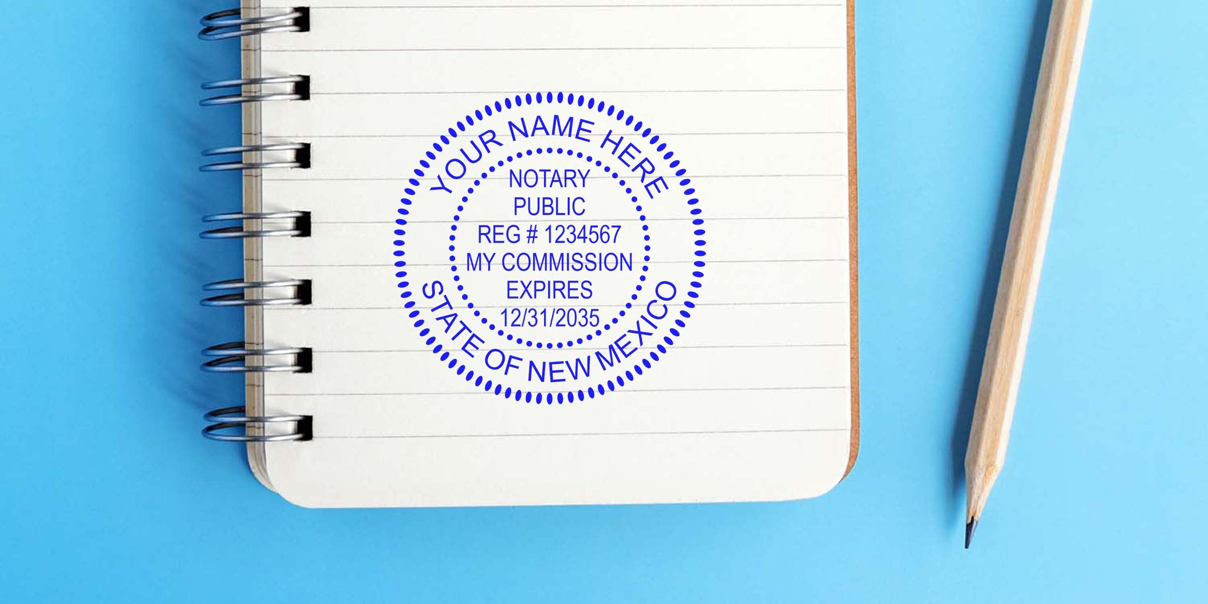 Blue circular notary public stamp mockup reading "Your Name Here – State of New Mexico" stamped on lined spiral notebook beside a wooden pencil, concept image for notary services with commission details and expiration date.