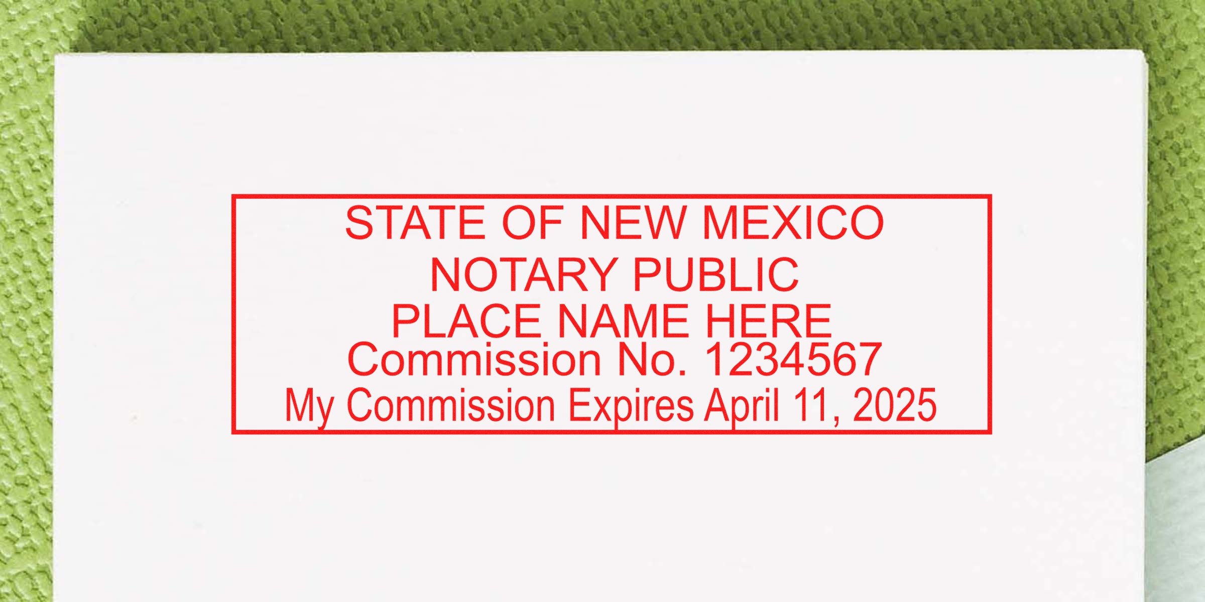 Red rectangular New Mexico notary public stamp on white paper reading "PLACE NAME HERE, Commission No. 1234567, My Commission Expires April 11, 2025"