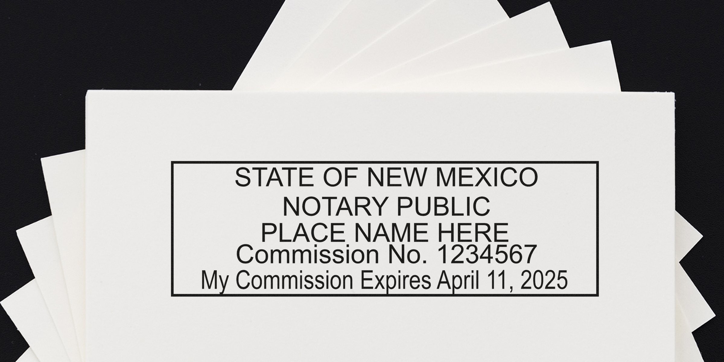 Close-up of a rectangular State of New Mexico notary public stamp imprint on white paper showing placeholder name, Commission No. 1234567 and commission expiration date April 11, 2025