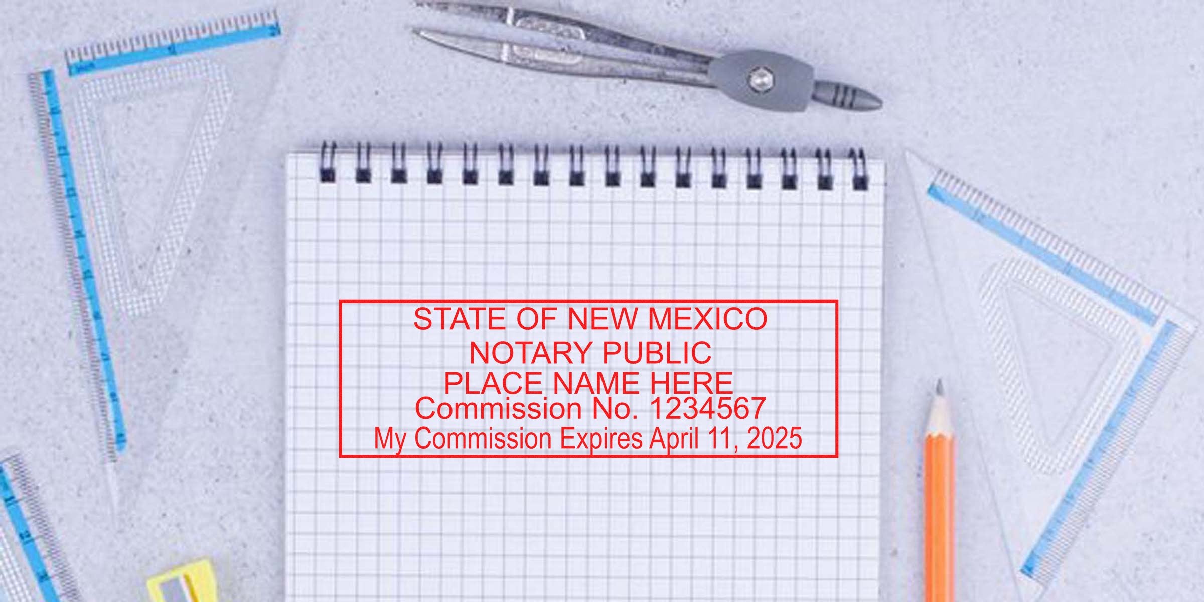 Close-up of a red New Mexico notary public stamp impression on a spiral graph notebook reading "Place Name Here, Commission No. 1234567, My Commission Expires April 11, 2025" with pencil and drafting tools surrounding