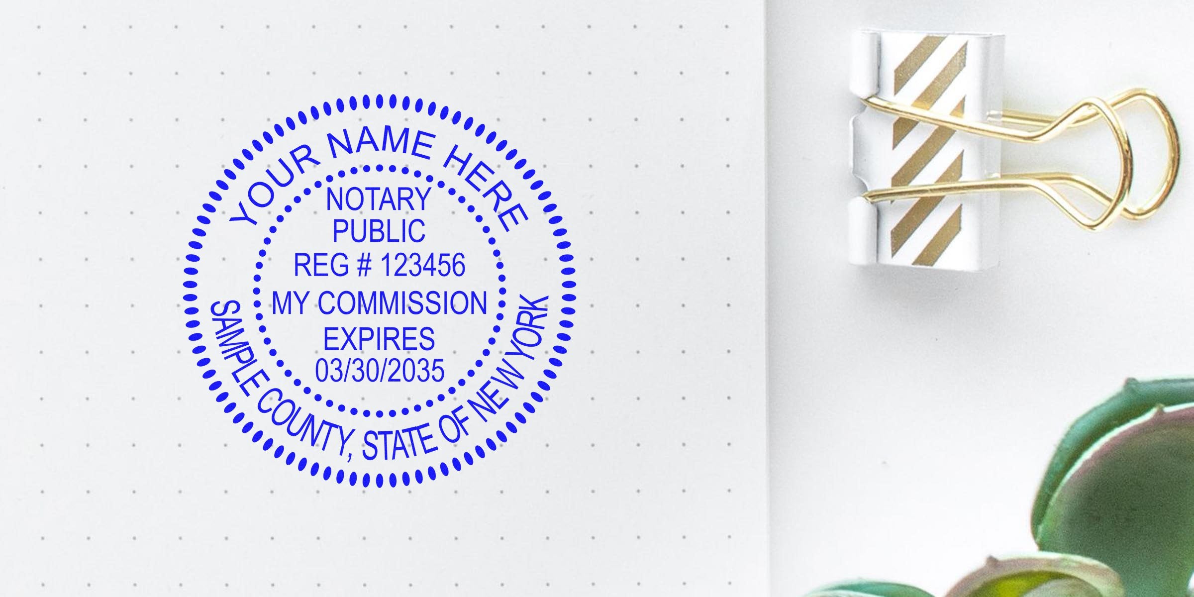 Blue circular notary public stamp mockup on dotted notebook page showing registration #123456 and commission expiry 03/30/2035, with gold binder clip and succulent nearby