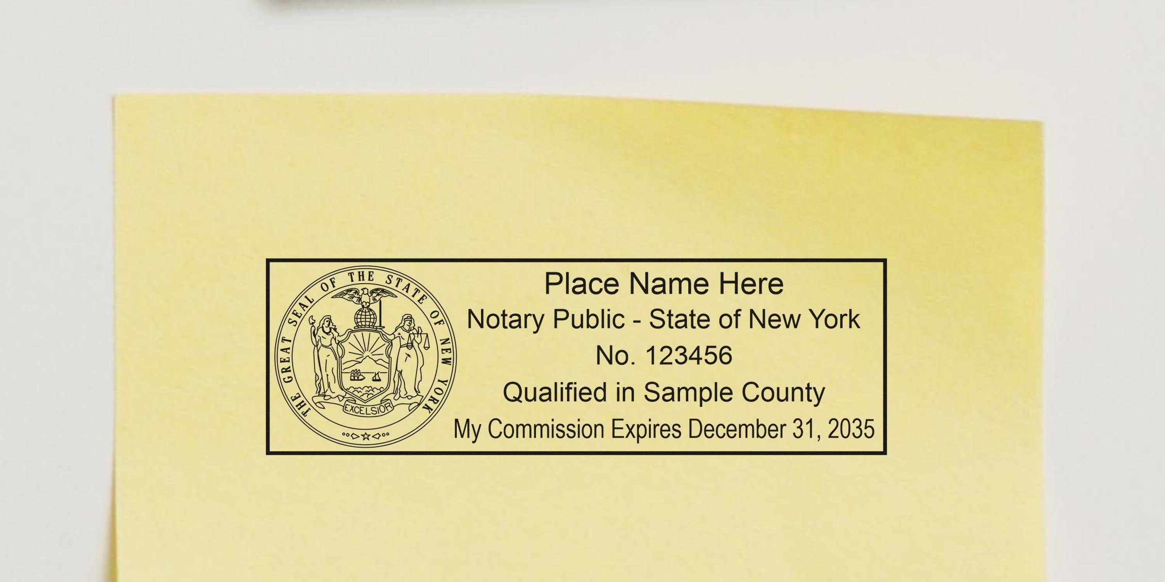 Yellow sticky note featuring a sample New York Notary Public rubber stamp impression with state seal, placeholder name, commission number and expiration date.