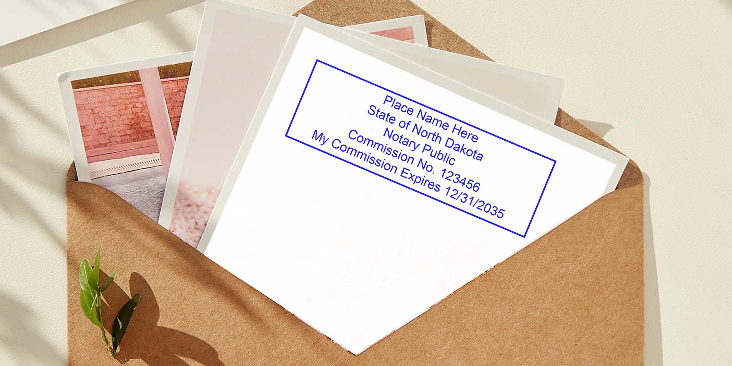 Brown kraft envelope with printed photos and a white card showing a blue notary public stamp reading "State of North Dakota" and commission info.