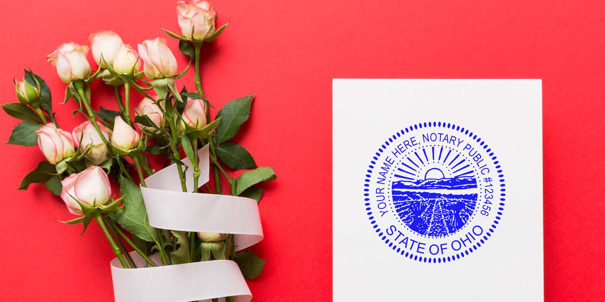 Bouquet of pale pink roses wrapped with white ribbon beside a white card stamped with a blue State of Ohio notary public seal on a red background