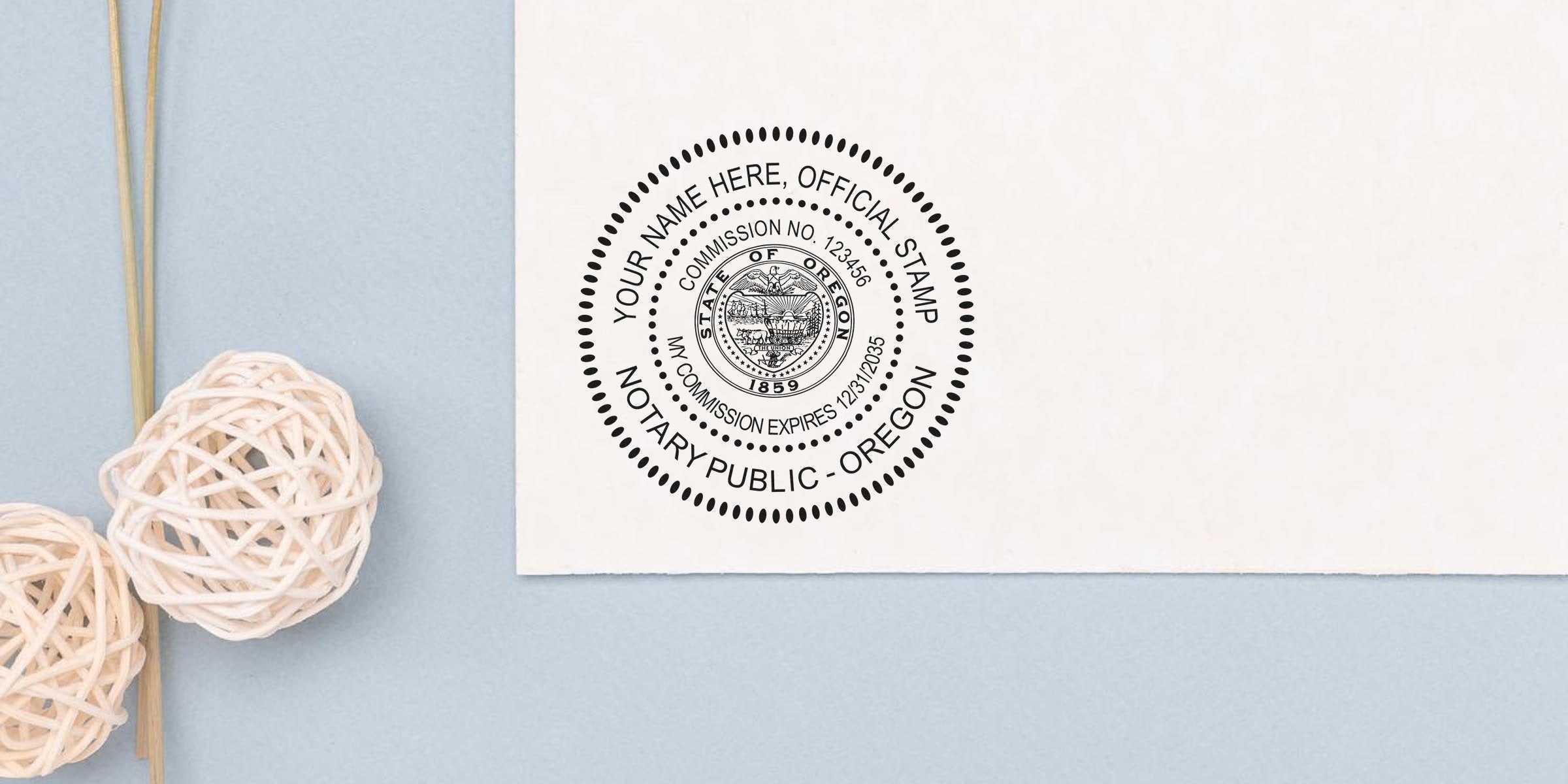 Official notary public stamp mockup on white paper featuring the State of Oregon seal, circular customizable notary stamp design, with decorative wicker balls on blue background