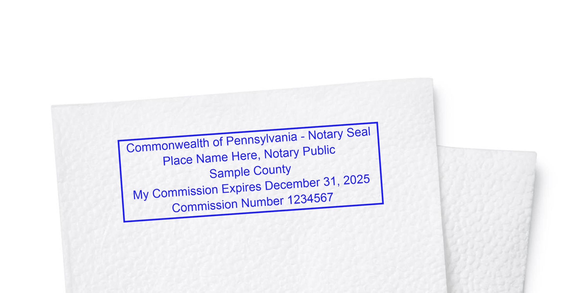 Blue rectangular Pennsylvania notary seal stamp on textured white paper showing sample text: "Commonwealth of Pennsylvania - Notary Seal, Place Name Here, Notary Public, Sample County, My Commission Expires December 31, 2025."