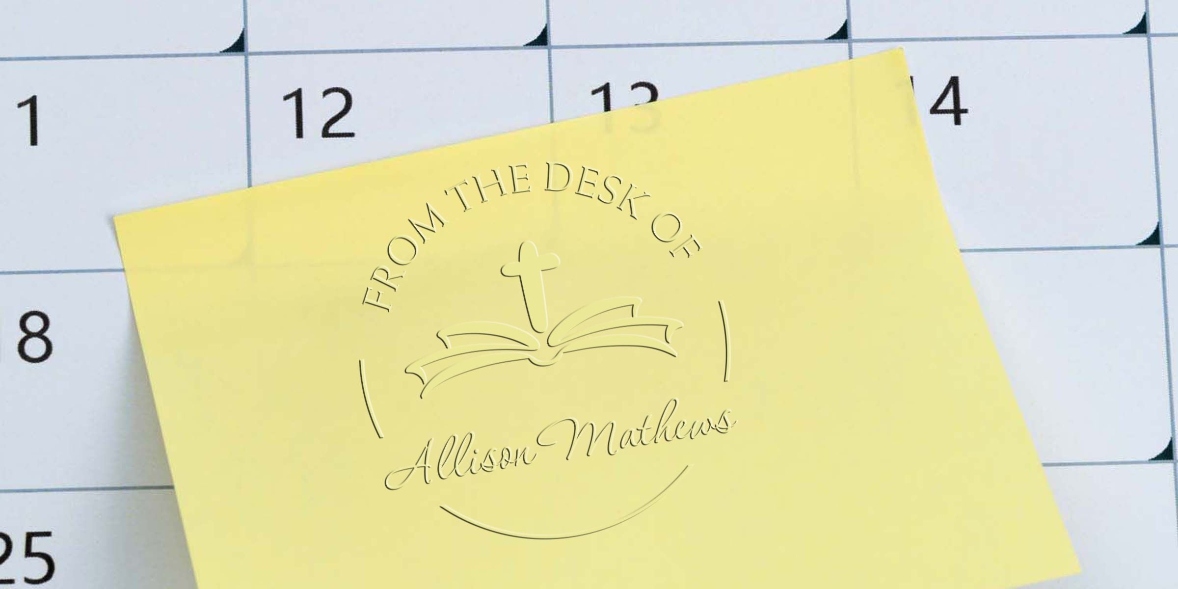 Yellow greeting card on a calendar grid, with embossed circular logo reading “From the Desk of Allison Mathews.”