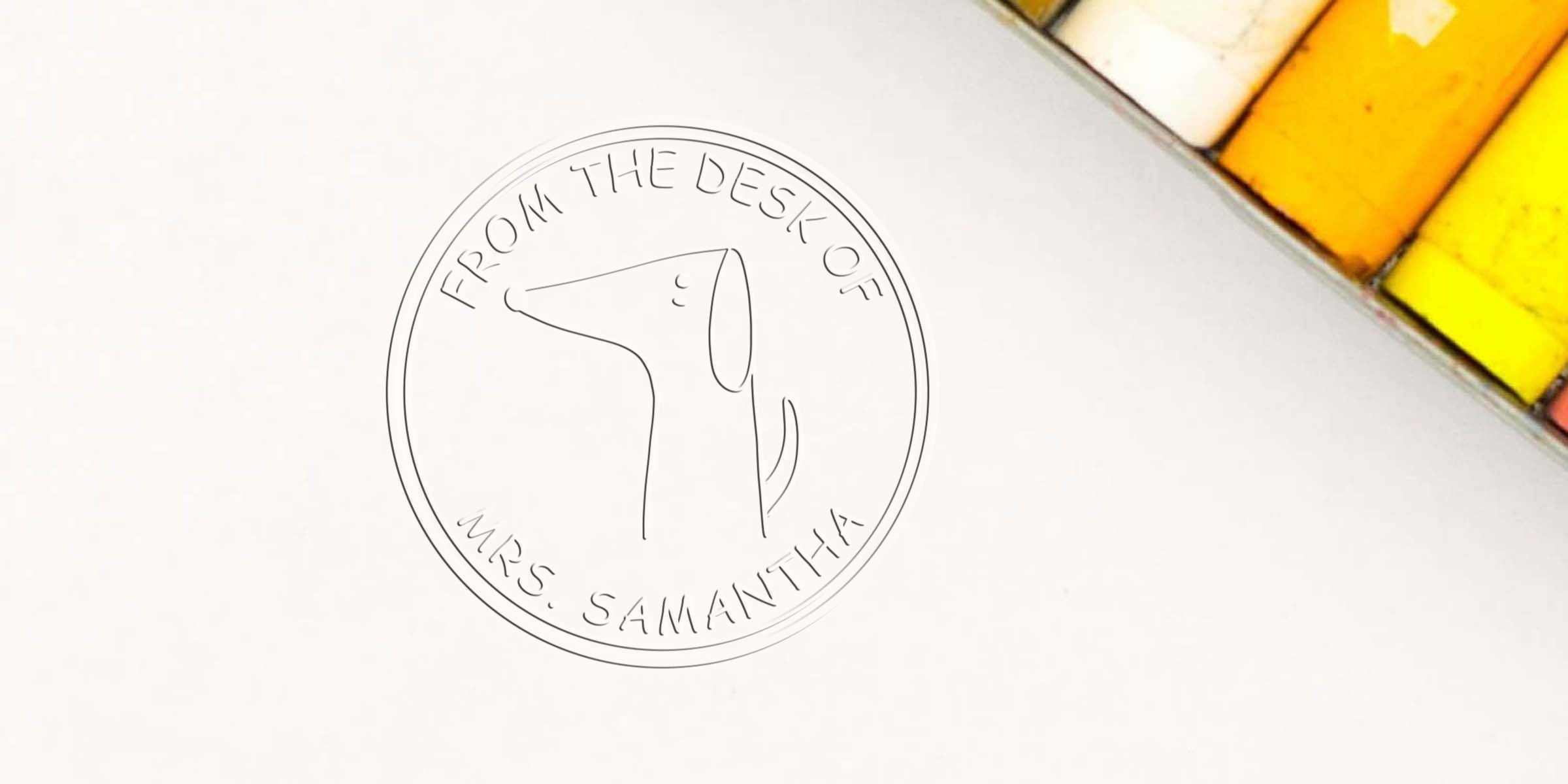 Line drawing of a hair dryer inside a circular badge reading “From the desk of Mrs. Samantha.”