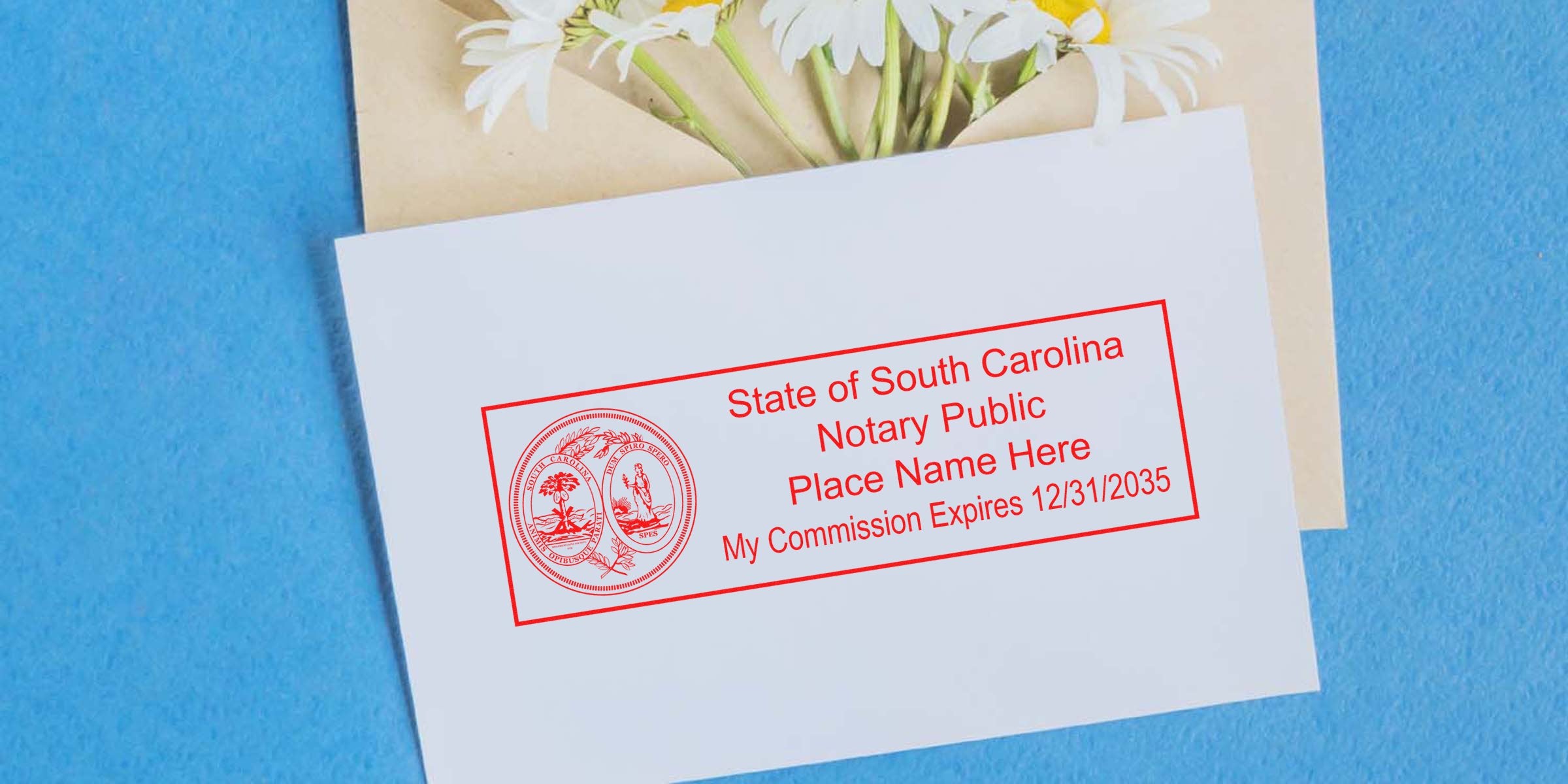 Envelope with red State of South Carolina notary public stamp reading "Place Name Here, My Commission Expires 12/31/2035", kraft envelope and white daisies on blue background