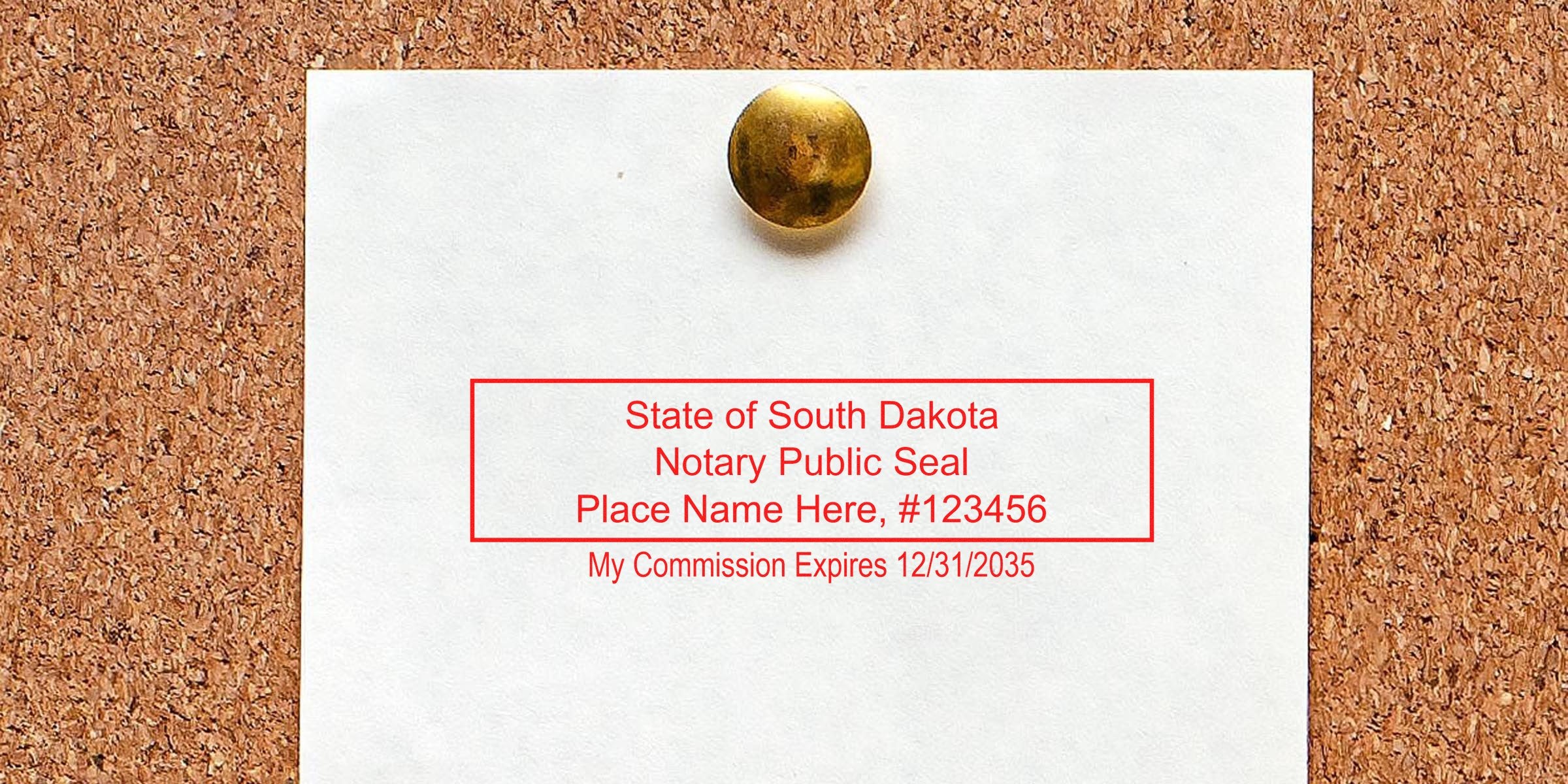 Brass thumbtack pinning white paper to a corkboard showing a red rectangular "State of South Dakota Notary Public Seal" sample with placeholder name, number and commission expiry date.