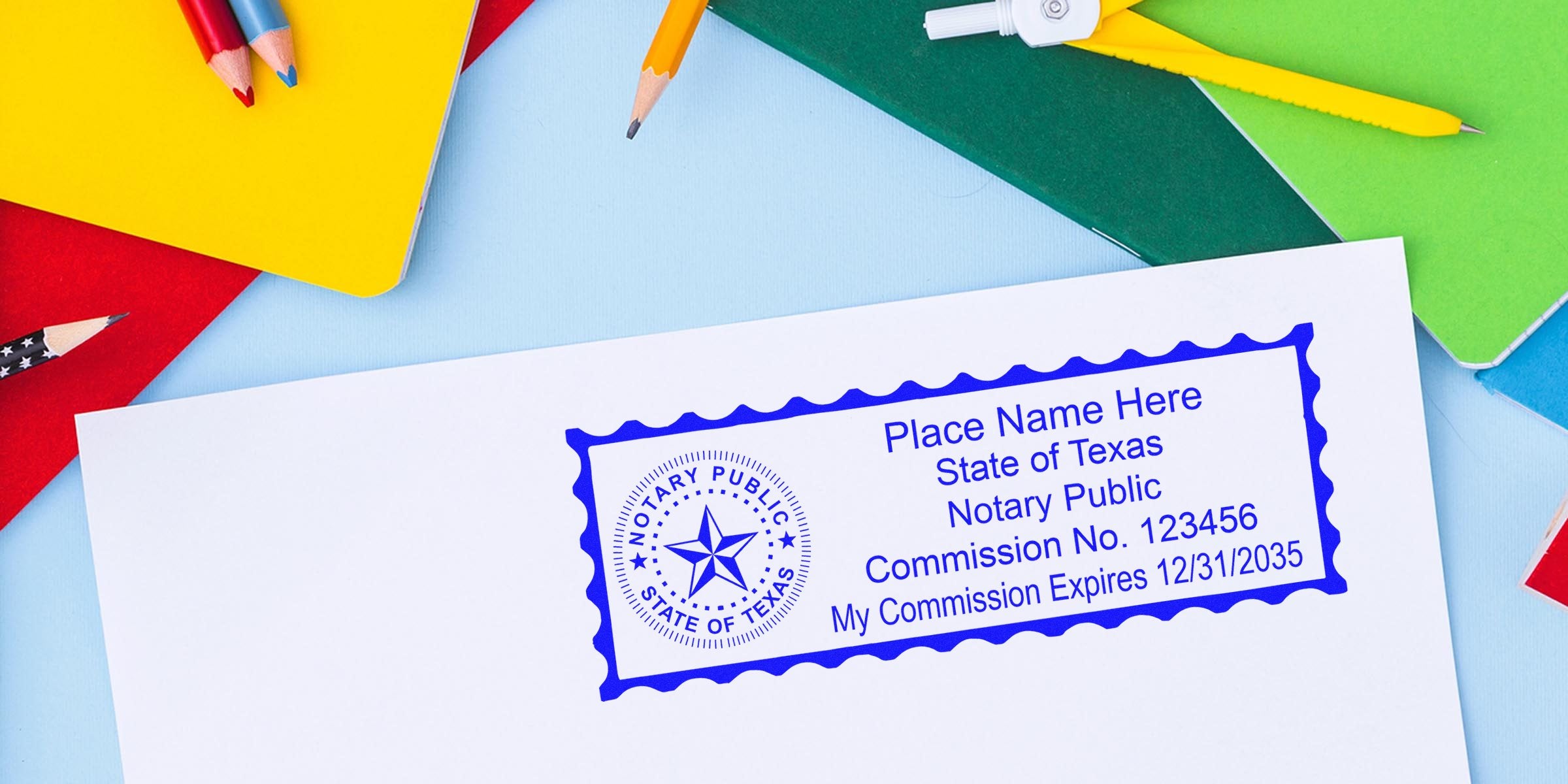 Blue Texas notary public stamp on white paper showing commission number and expiry date, surrounded by colorful notebooks and pencils