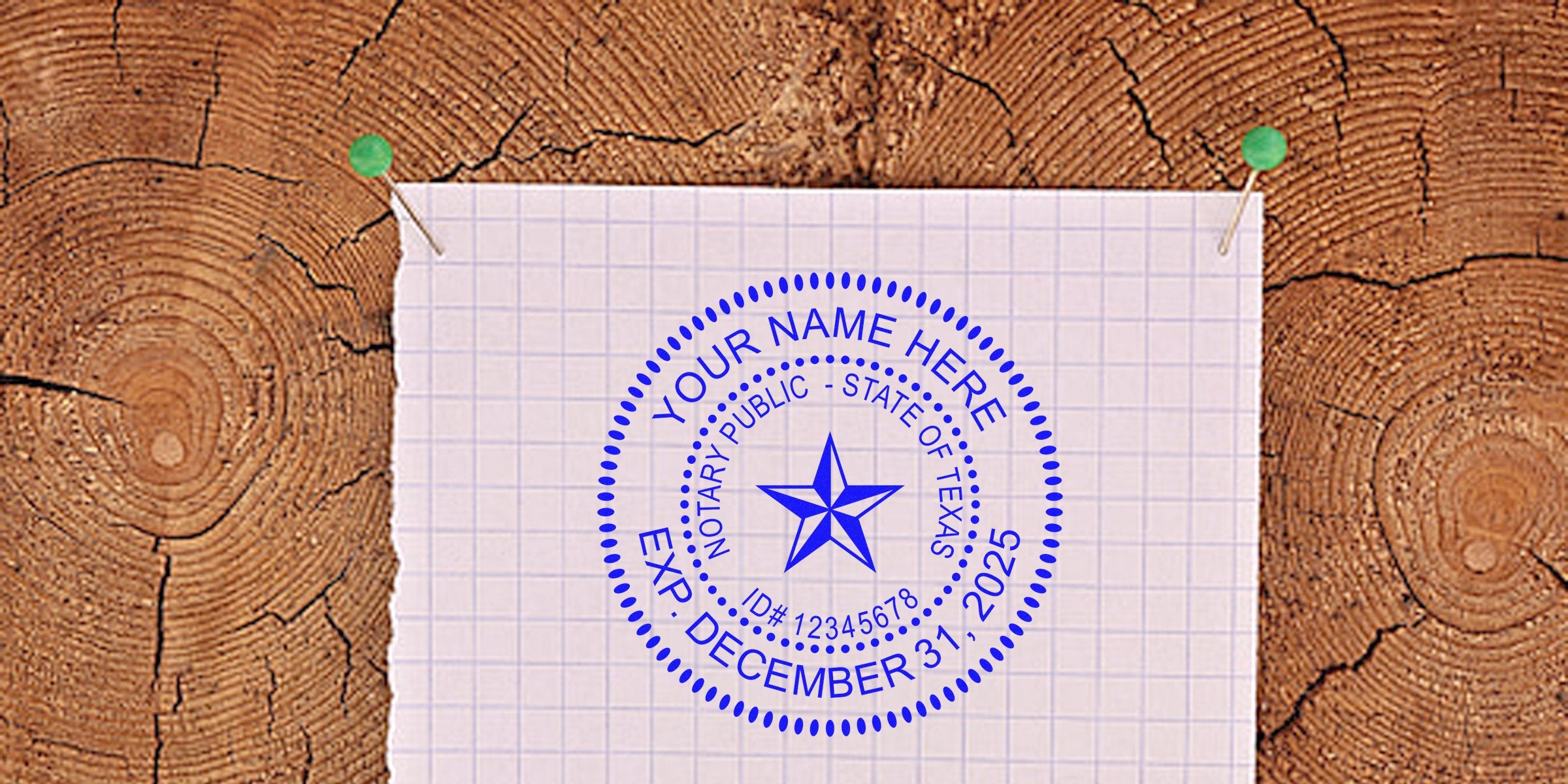 Blue Texas notary public circular seal stamped on grid notebook paper pinned to a wooden tree‑ring background with two green pushpins