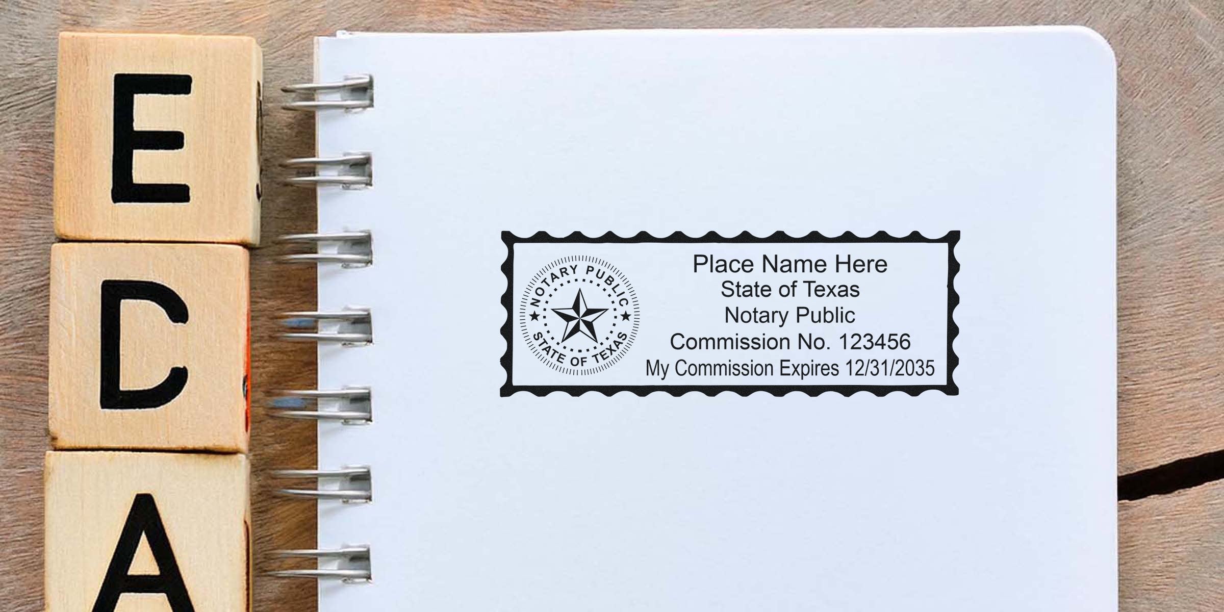 Blank Texas notary stamp imprint on a white spiral notebook showing state seal, placeholder name, sample commission number and expiration date, positioned beside stacked wooden blocks on a wooden desk for notary office or legal branding