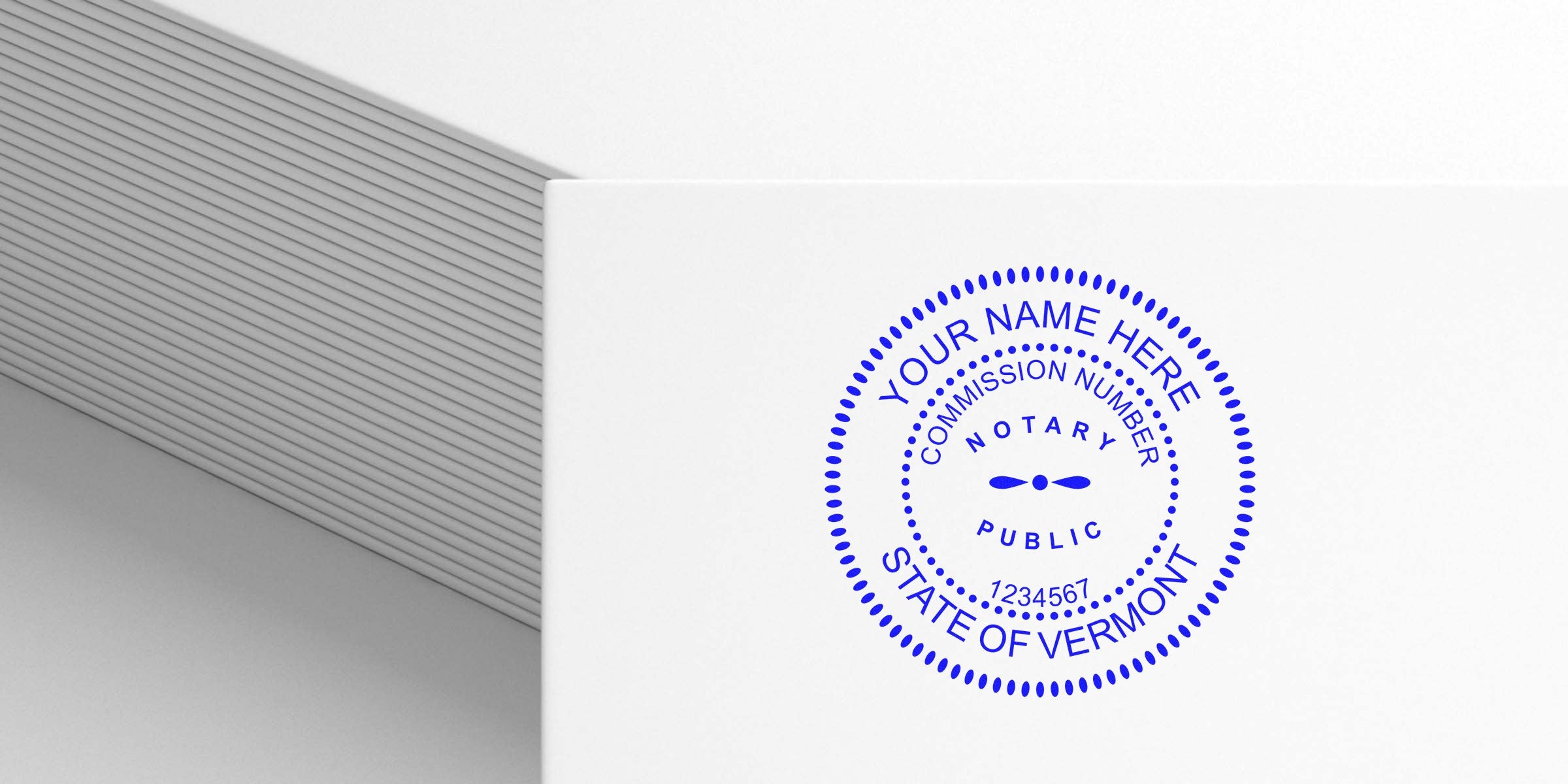 Blue circular notary public seal stamped on white paper reading "Your Name Here, State of Vermont" with commission number, dotted border and minimalist textured gray background