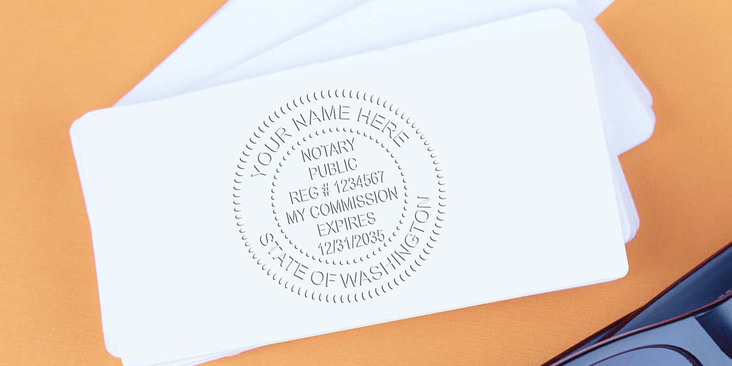 Embossed notary public seal imprint on stacked white business cards reading "Notary Public, State of Washington" on orange background with eyeglasses visible