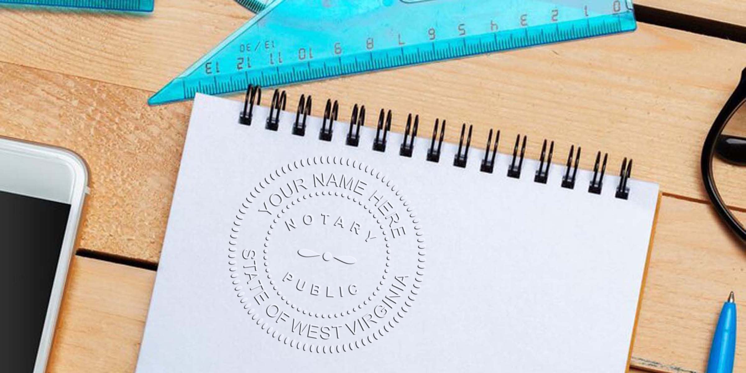 Spiral notebook on wooden desk with embossed "Notary Public - State of West Virginia" seal, blue ruler, smartphone, eyeglasses and blue pen—office stationery flat lay for notary services