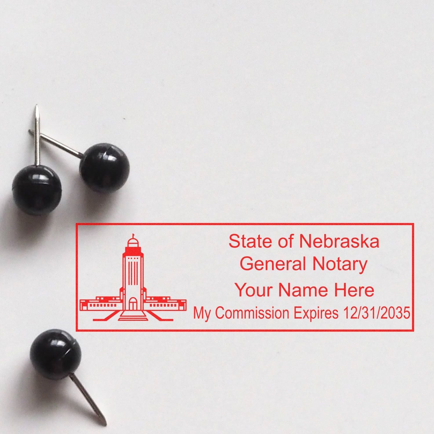 Nebraska Notary Stamp: Your Key to Authorized Documents Feature Image. Red notary stamp with Nebraska state capitol and black push pins.