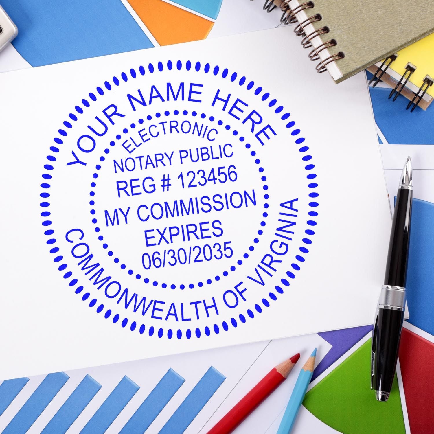 Image of a Virginia notary stamp on a desk with office supplies. Blog post: Notary Stamps Demystified: Price Factors and Cost Breakdown Feature Image.