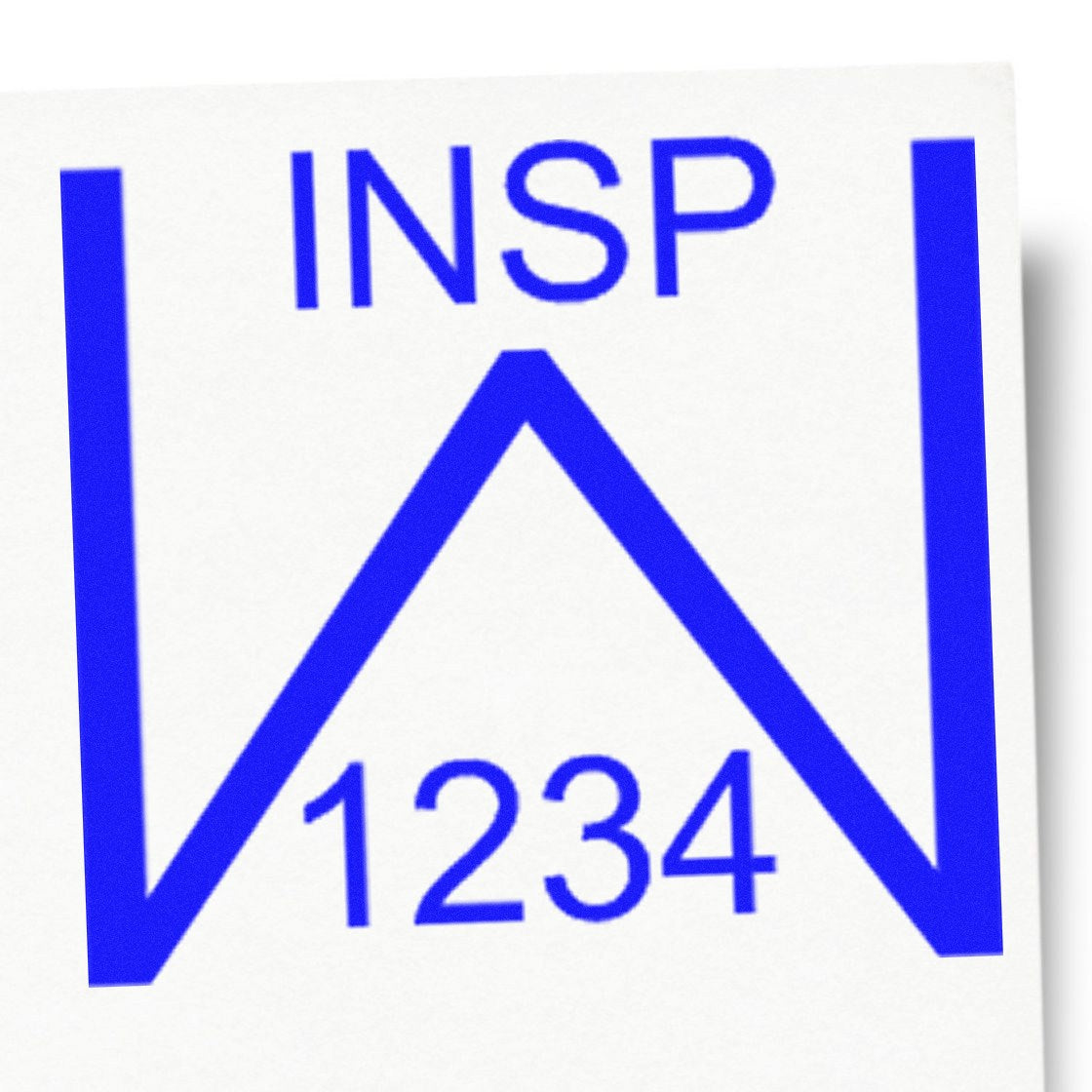 Blue INSP 1234 inspection stamp seal with bold blue geometric border on white background