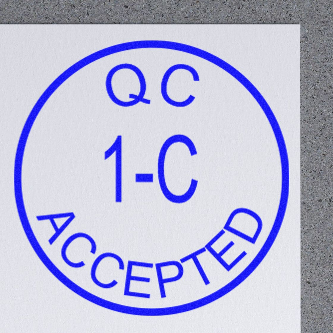 Blue QC 1-C ACCEPTED circular rubber stamp seal on white paper