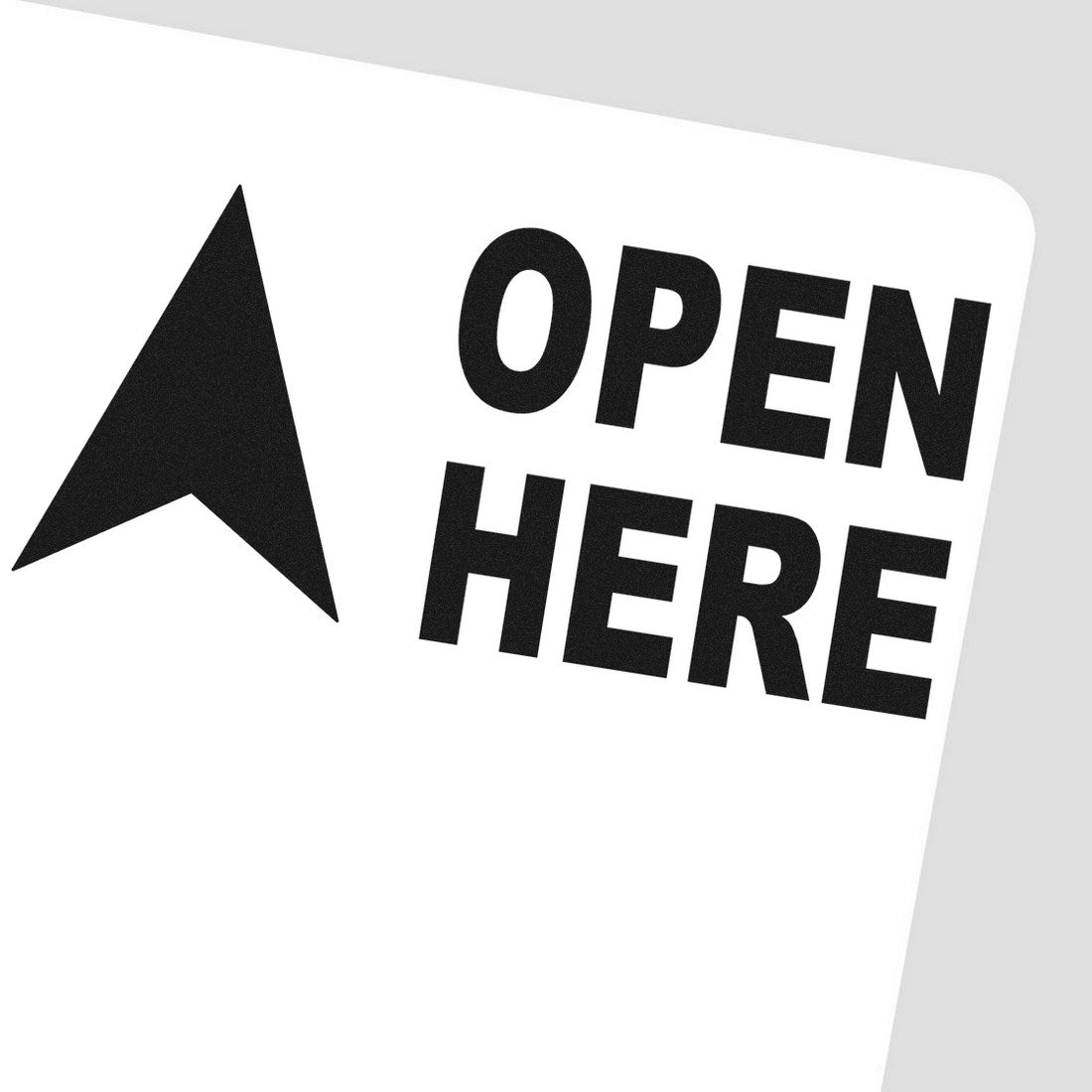 Image of the Slim Pre-Inked Arrow Open Here Stamp featuring a bold black arrow and OPEN HERE text on a white background, ideal for clear package instructions.