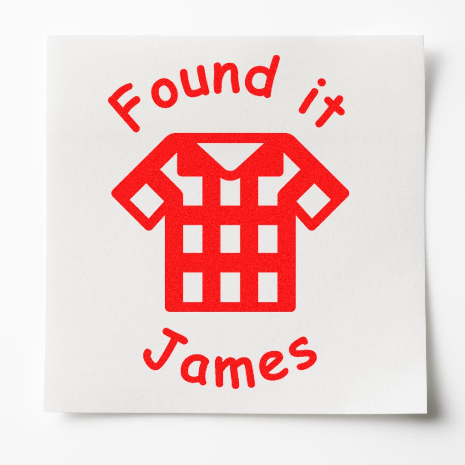 Red custom rubber stamp seal with T-shirt icon and Found it James on white background.