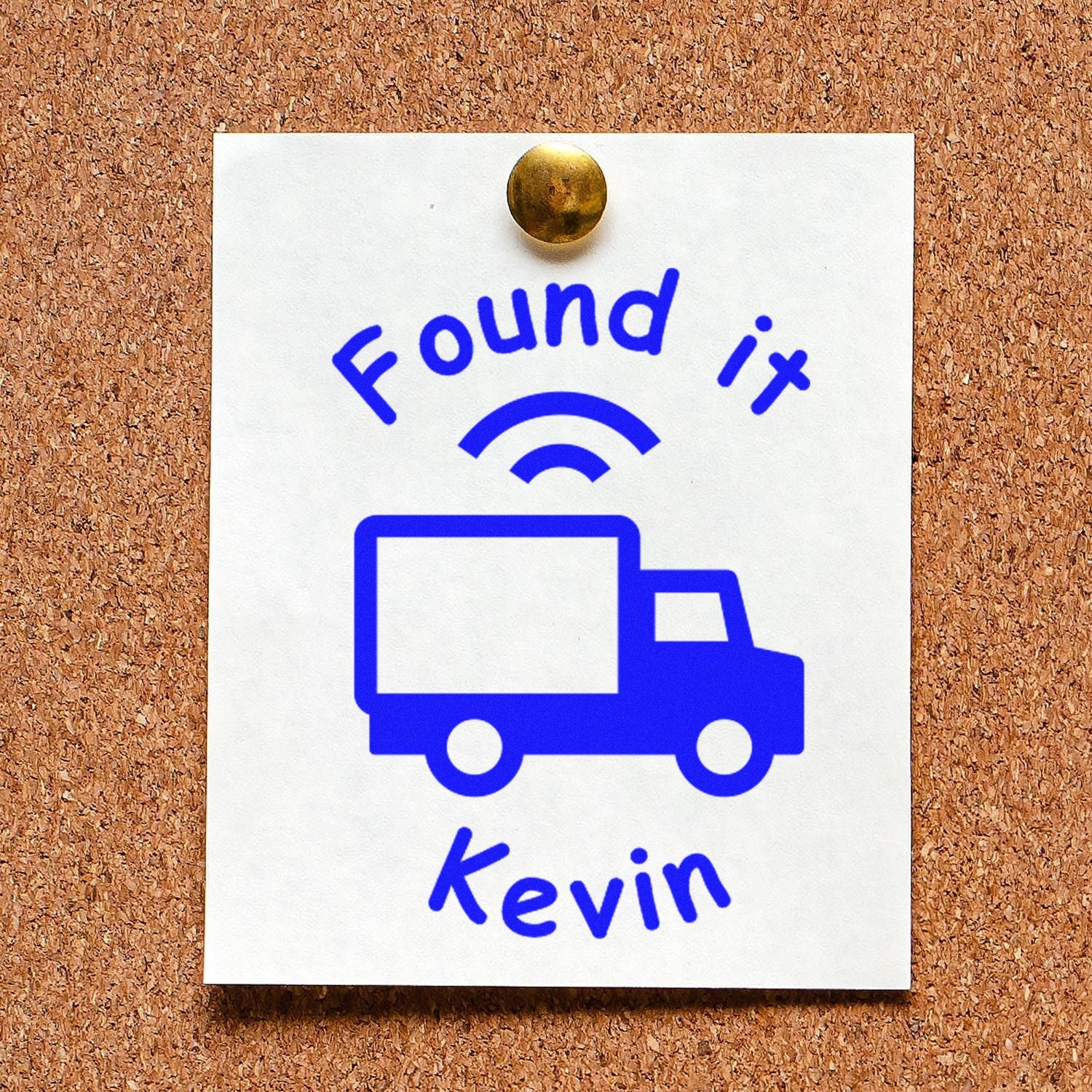 Blue custom stamp and seal design with truck icon, Found it, and Kevin on a white card pinned to corkboard.