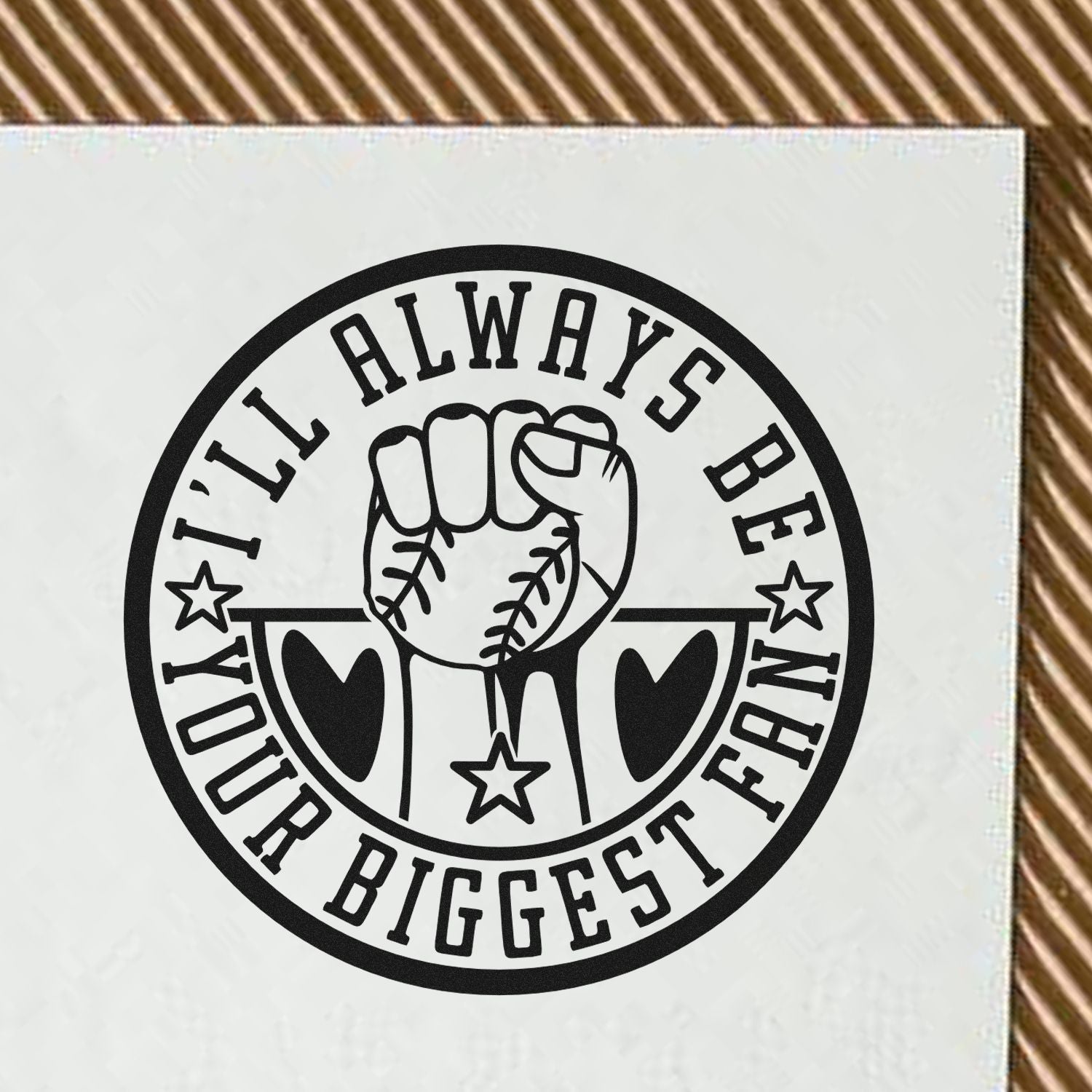 Black circular rubber stamp seal with a clenched baseball fist, stars, and Ill always be your biggest fan on white.