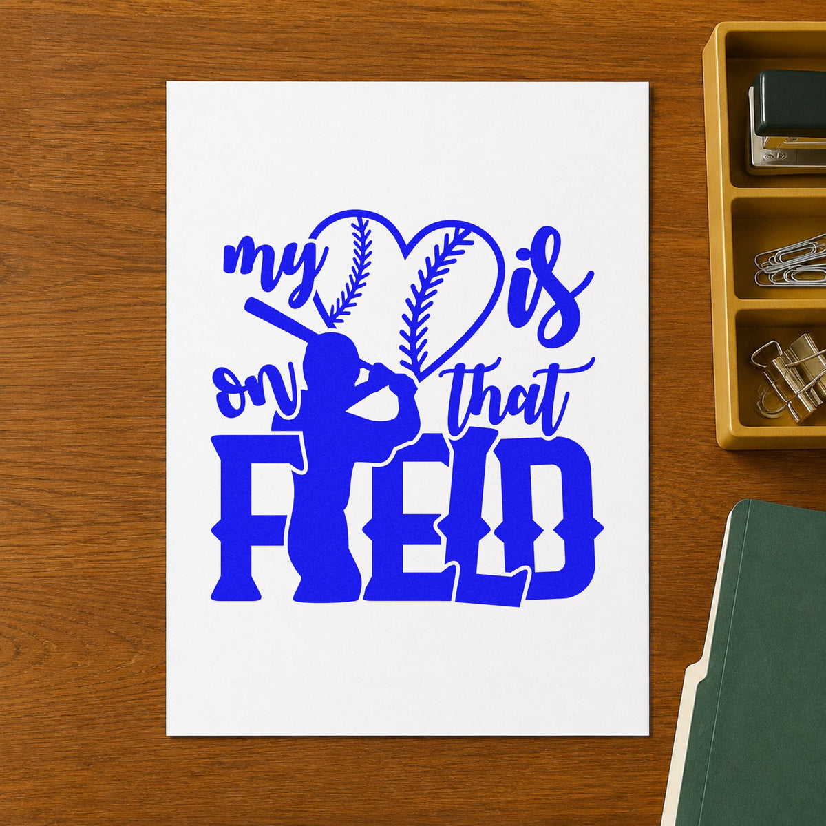 My Heart Is on That Field craft stamp imprinted in blue ink on paper, a design suited to photo mat signing.