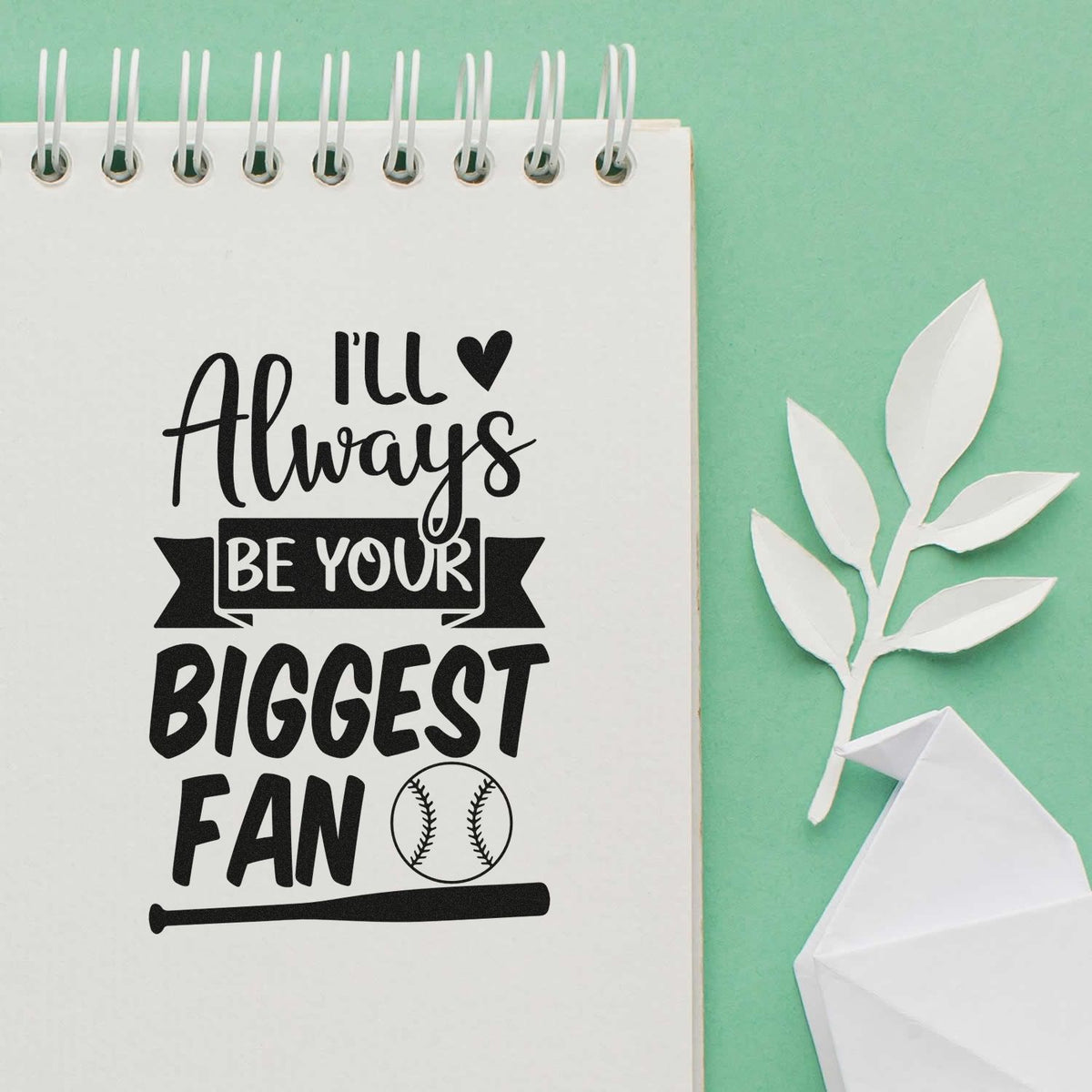 Premium Wooden Always Your Biggest Fan Stamp - Vintage Pro imprint stamped in black ink. Mixed lettering reads "I'll always be your biggest fan," with a ribbon, hearts, baseball, and bat.