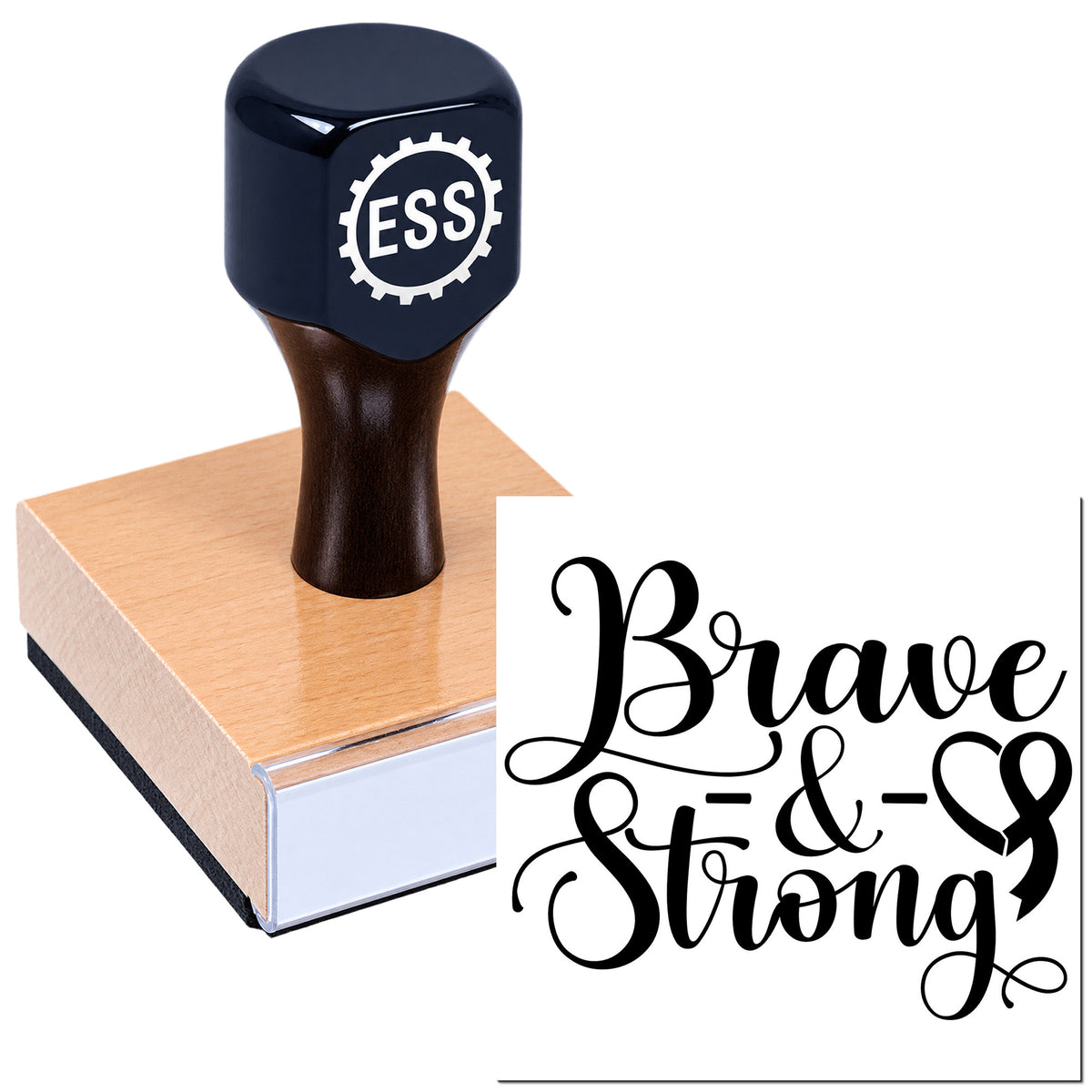 Black ESS custom rubber stamp and seal on wooden block with bold Brave & Strong script on white background.