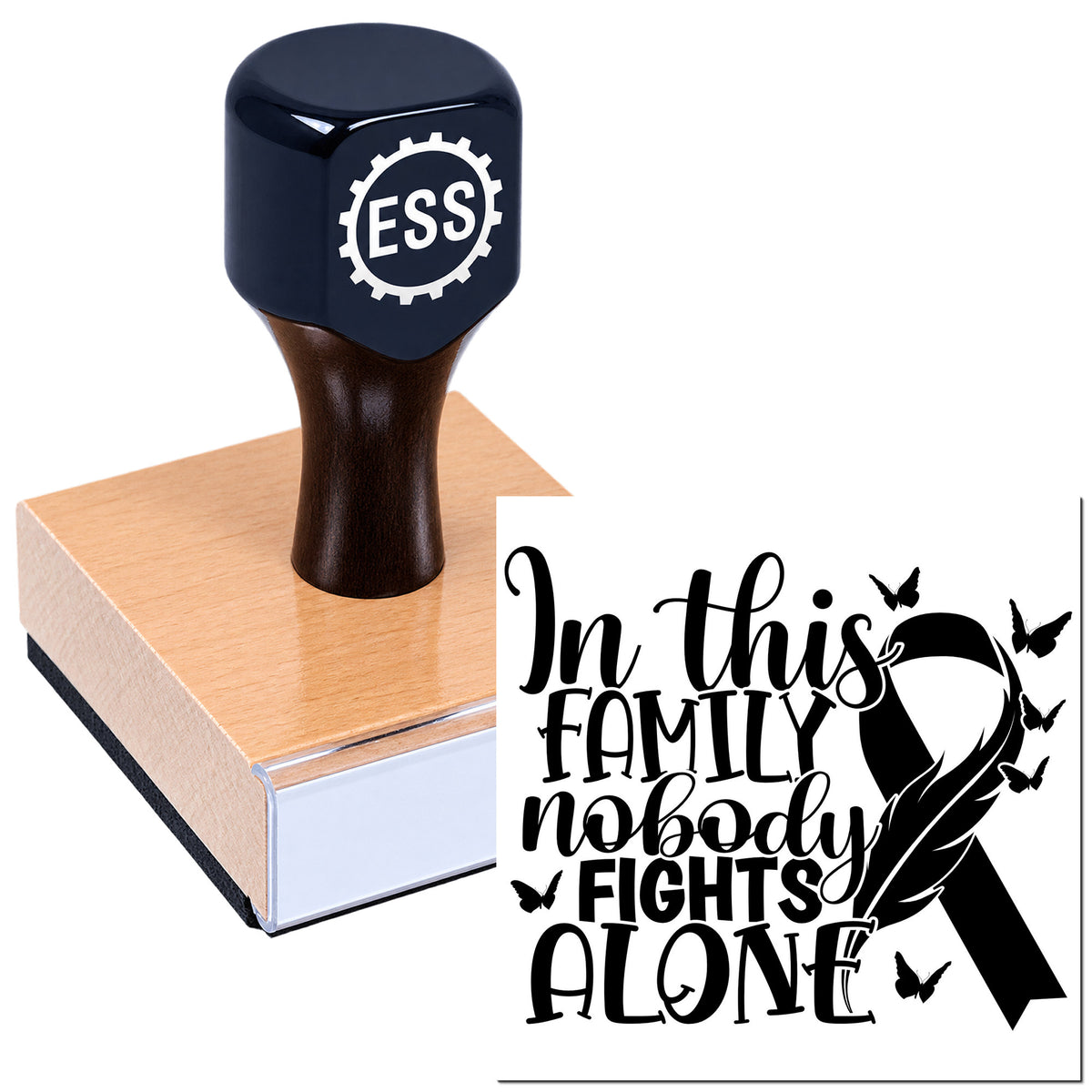 Dark navy custom stamp on rose-gold seal block with "In this family nobody fights alone" ribbon, butterflies and black lettering