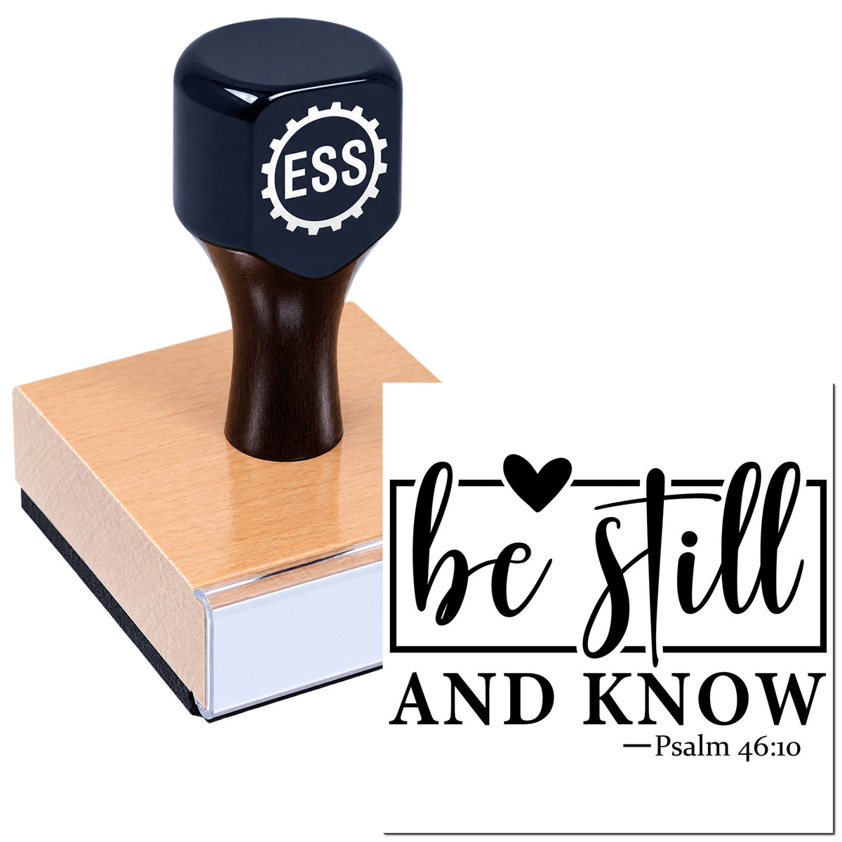 Dark blue ESS stamp and seal on wooden block with black "be still and know" Psalm 46:10 design.