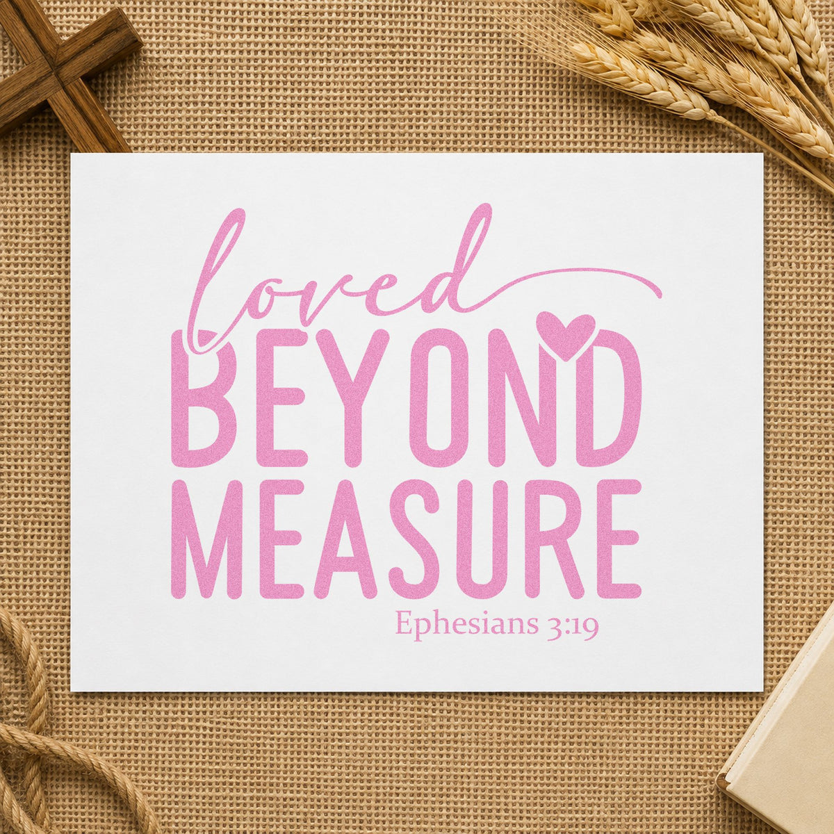 Loved Beyond Measure craft stamp in purple ink on cardstock, an easy option for nursery wall art.