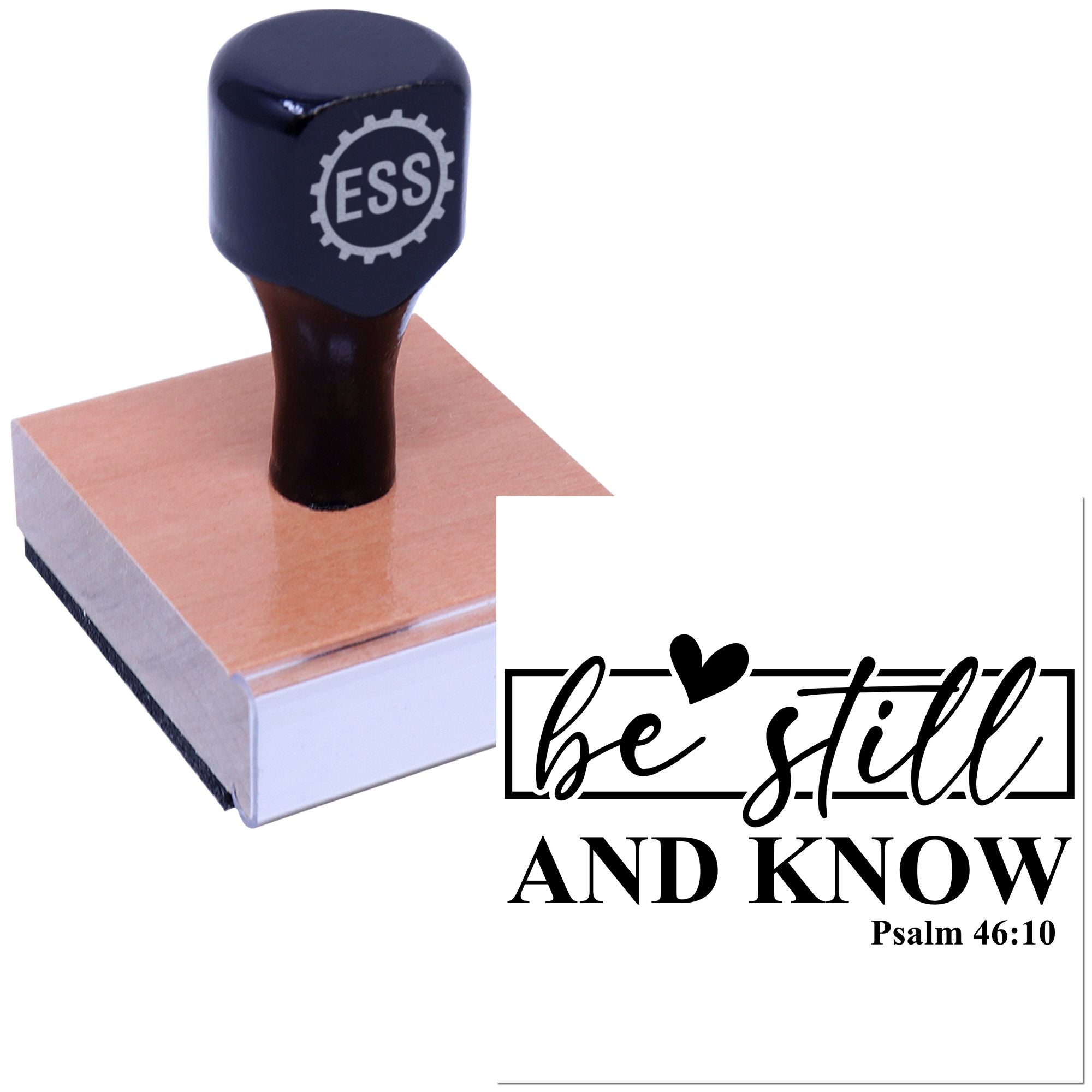Black ESS stamp seal on a wooden base with a white be still and know Psalm 46:10 design.