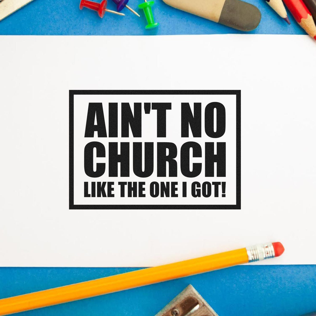 Premium Wooden Ain't No Church Block Stamp - Vintage Pro imprint stamped in black ink. A rectangular outline encloses bold stacked "Ain't no church like the one I got" lettering.