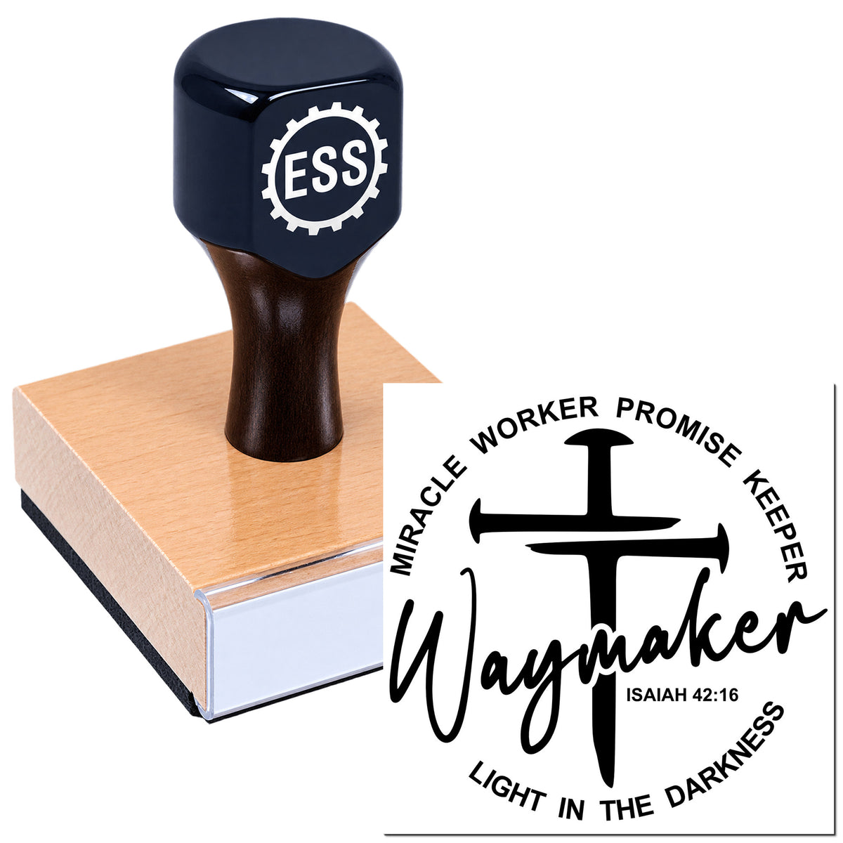 Black ESS stamp on a pink wooden block with Waymaker seal design and scripture text, on white background.