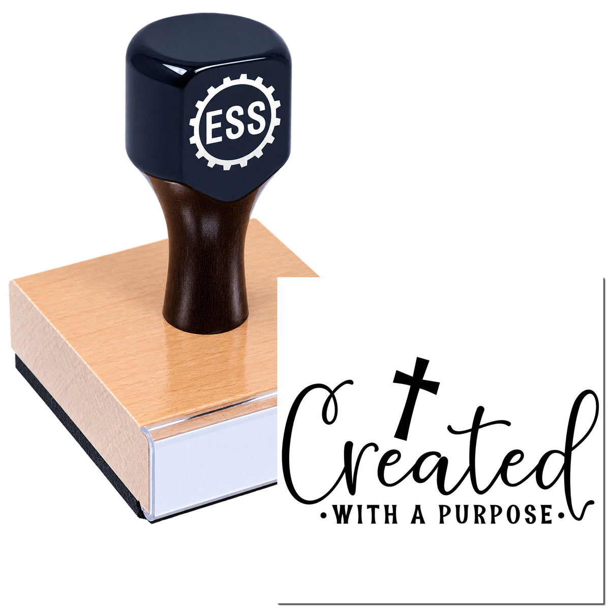 Black ESS rubber stamp and seal on a wooden block with copper top beside "Created with a Purpose" script.