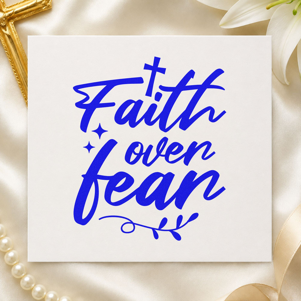 Faith over Fear Flourish craft stamp imprinted in blue ink on paper, a design suited to mission trip tags.