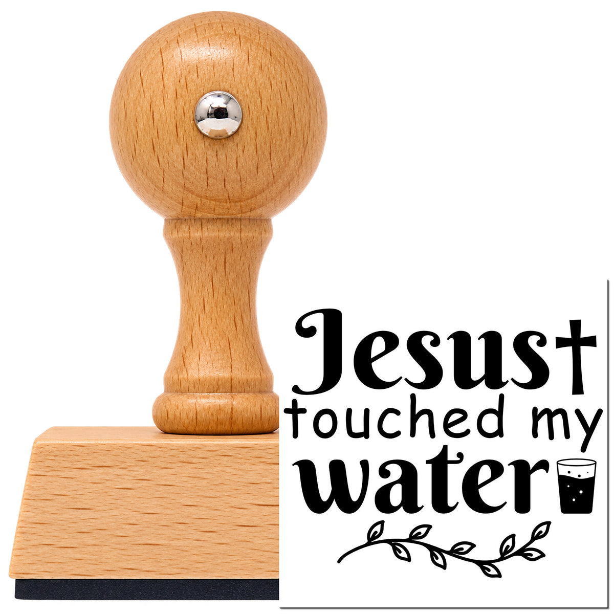 Vintage Pro beech wood stamp with a round knob handle, shown with its black Jesus Touched My Water imprint on white.