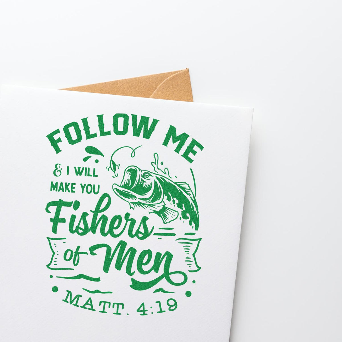 Green fish-themed stamp/seal design on white card with tan envelope, reading Follow Me & I Will Make You Fishers of Men