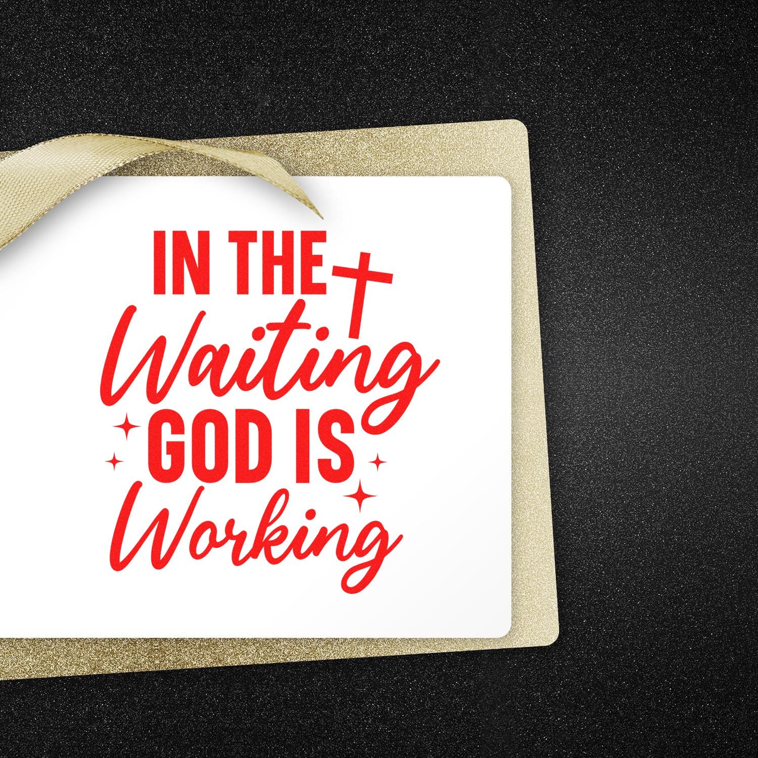 White stamp and seal card with red In the Waiting God Is Working text, gold glitter border, and cream ribbon on black background.