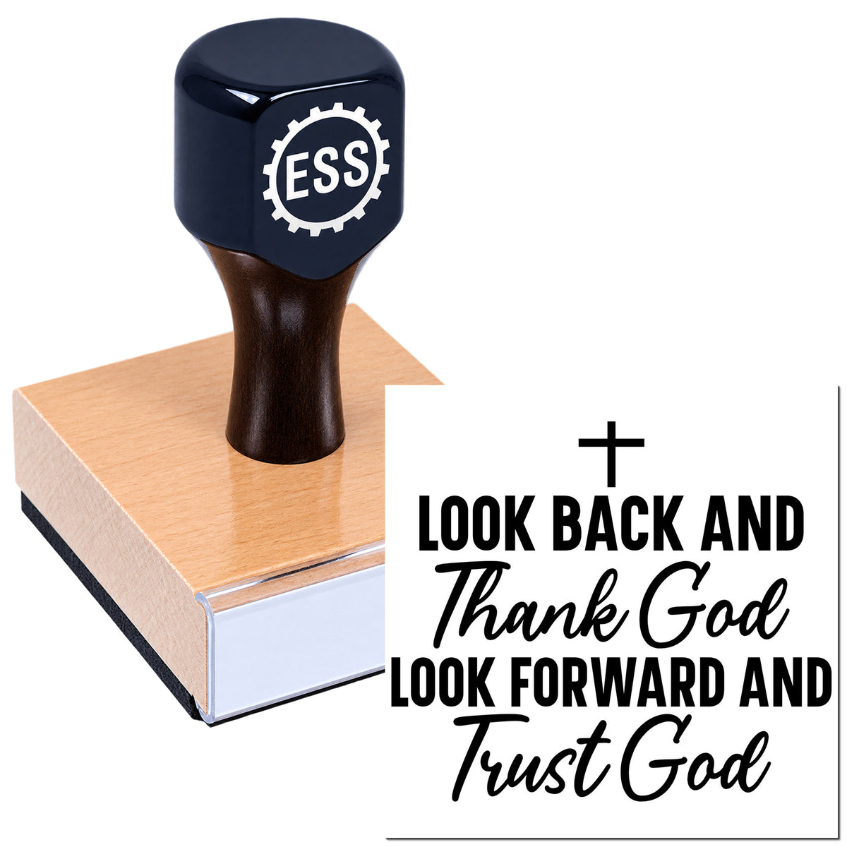 Dark blue ESS rubber seal stamp on wooden base with "Look Back and Thank God, Look Forward and Trust God" text and cross