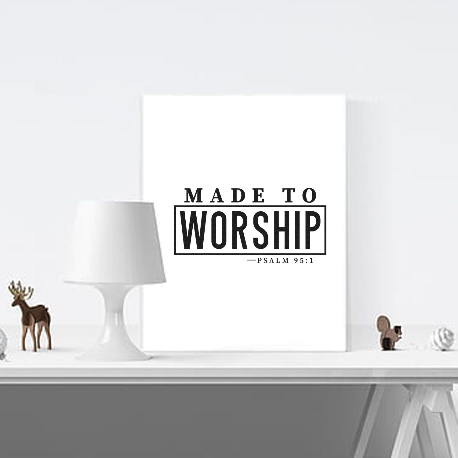 Black Made to Worship Psalm 95:1 stamp and seal design on a white plaque with minimalist decor