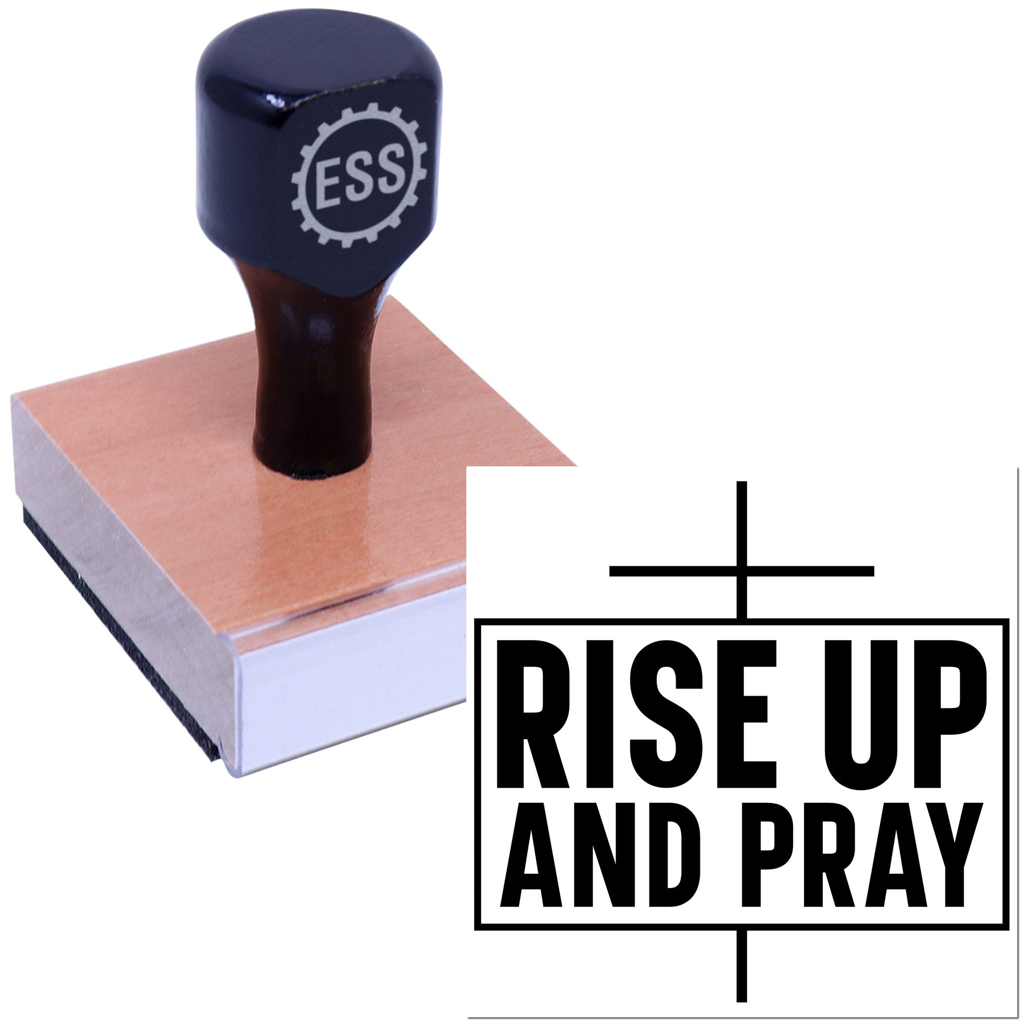 Dark blue ESS rubber stamp on tan wooden block with RISE UP AND PRAY seal design