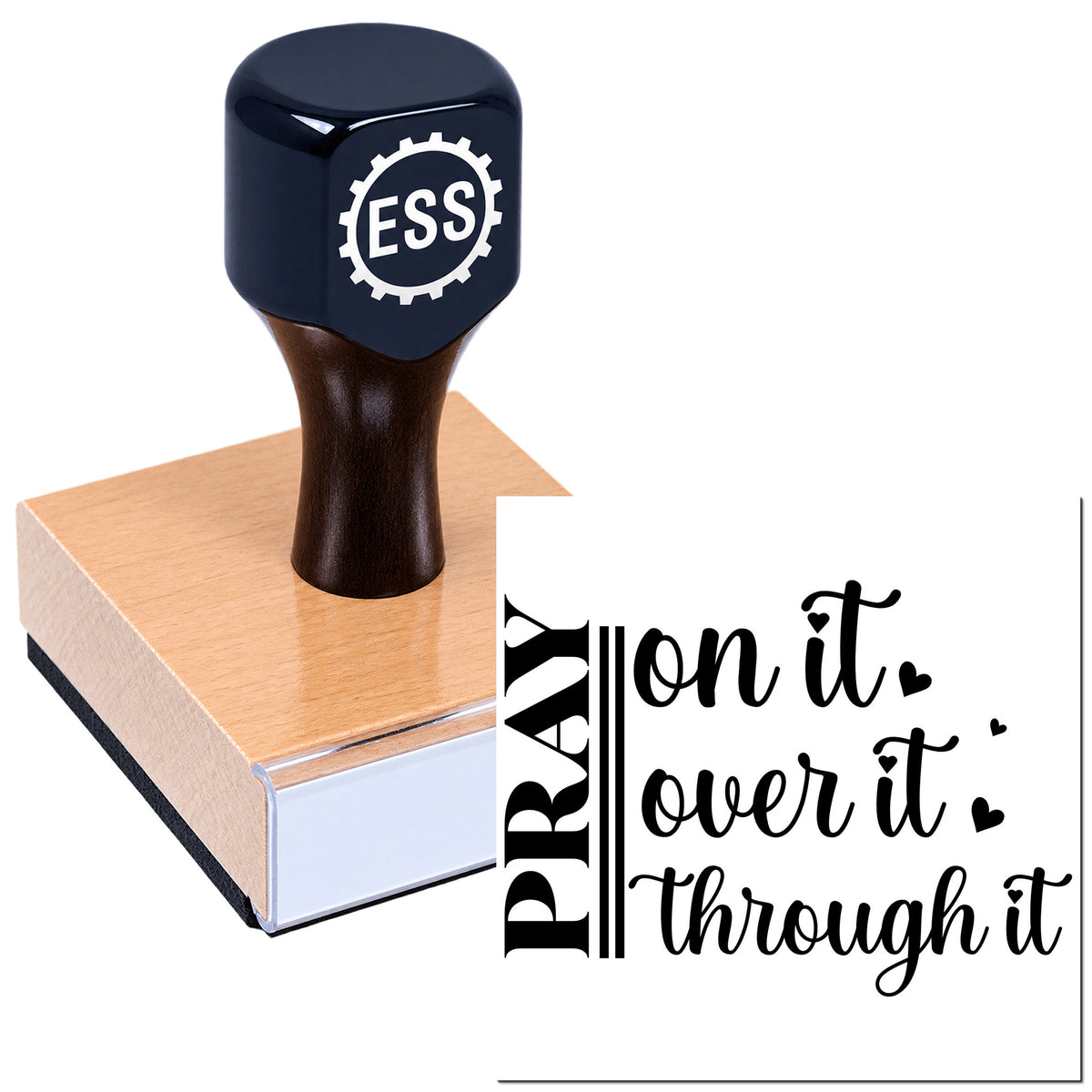 Dark blue ESS seal stamp on a wooden base beside black script text reading "All it takes..."