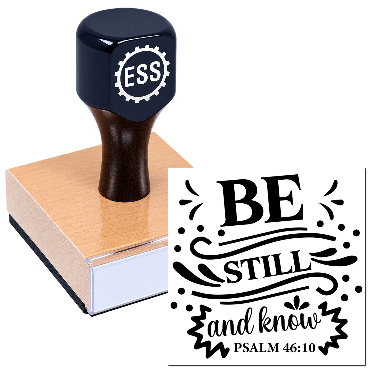 Dark blue rubber stamp and wooden seal block with black "BE still and know" Psalm 46:10 imprint.